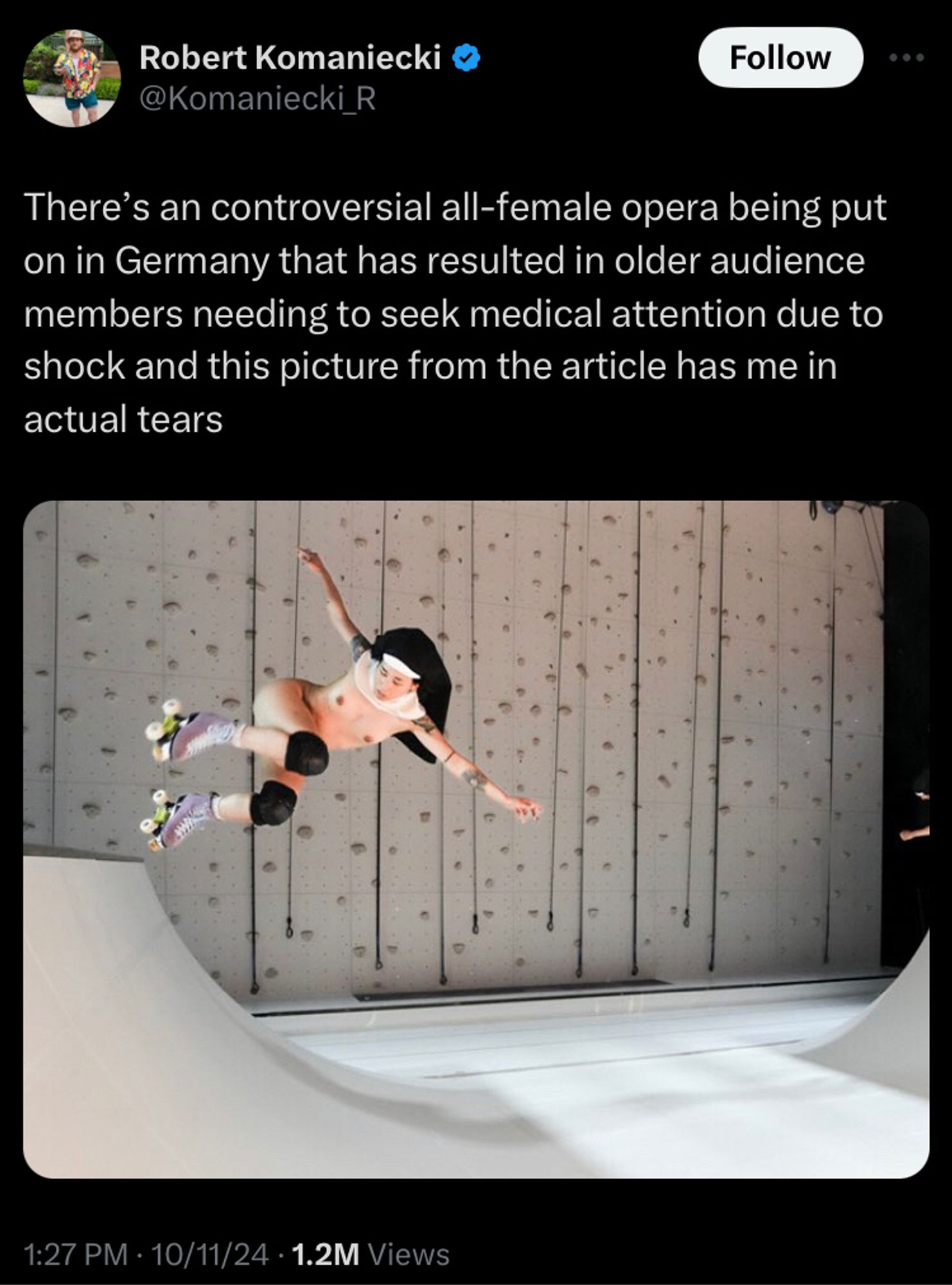 Tweet from Robert Komaniecki of a nude woman wearing a habit while roller skating on a stage with a ramp - There’s an controversial all-female opera being put on in Germany that has resulted in older audience members needing to seek medical attention due to shock and this picture from the article has me in actual tears