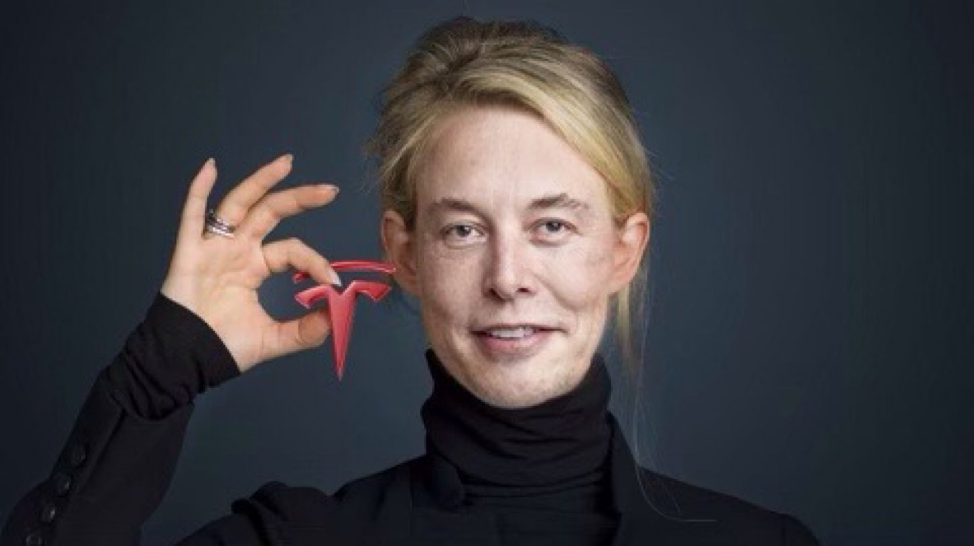 Photoshopped picture of elon as Elizabeth Holmes in the black Steve Jobs turtleneck holding up a little Tesla logo that looks a bit like an IUD 