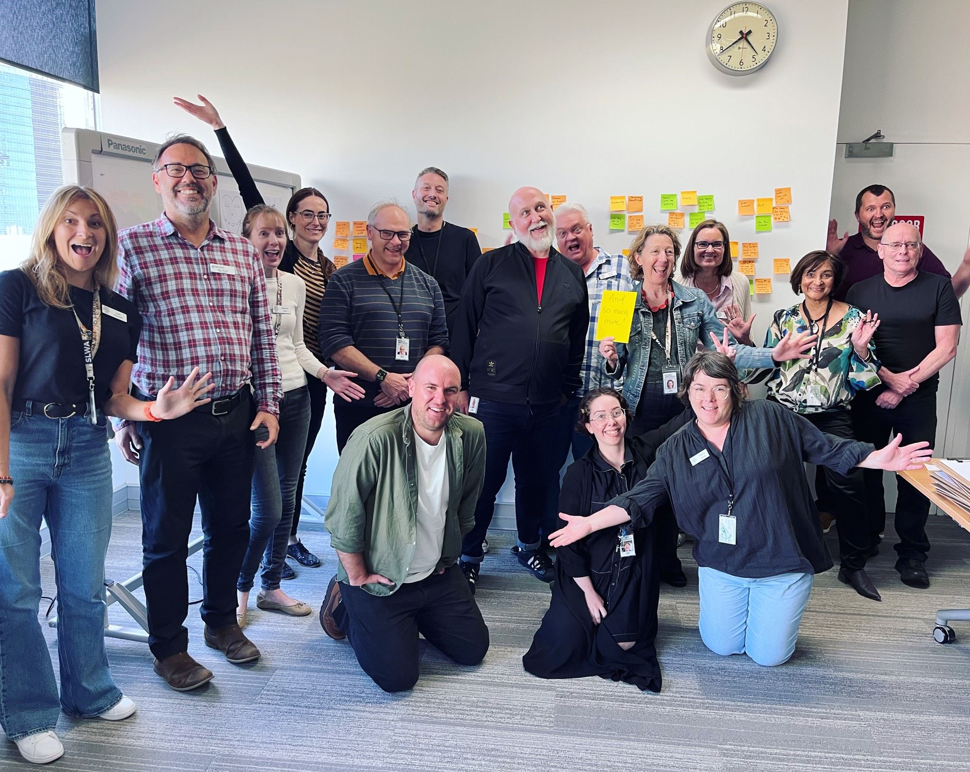 15 staff of the State Library of Western Australia (and me) pose for a photo on completion of a UX training course. They are happy!