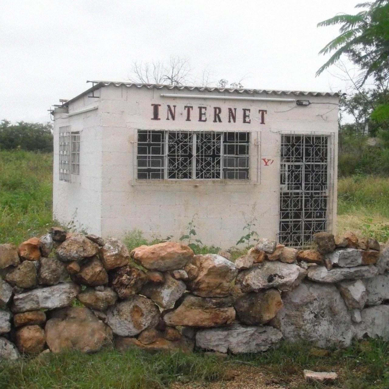 a little shack in the middle of nowhere. on it is the label “internet” and a small yahoo! y next to the door