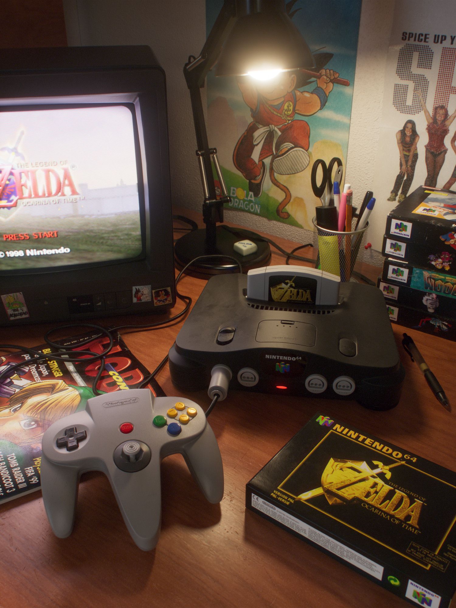 A Nintendo 64 on a desk. A small TV on its left is running Ocarina of Time. Scattered on the desk are other game boxes, a videogame magazine and other items reminiscent of the late 90s.