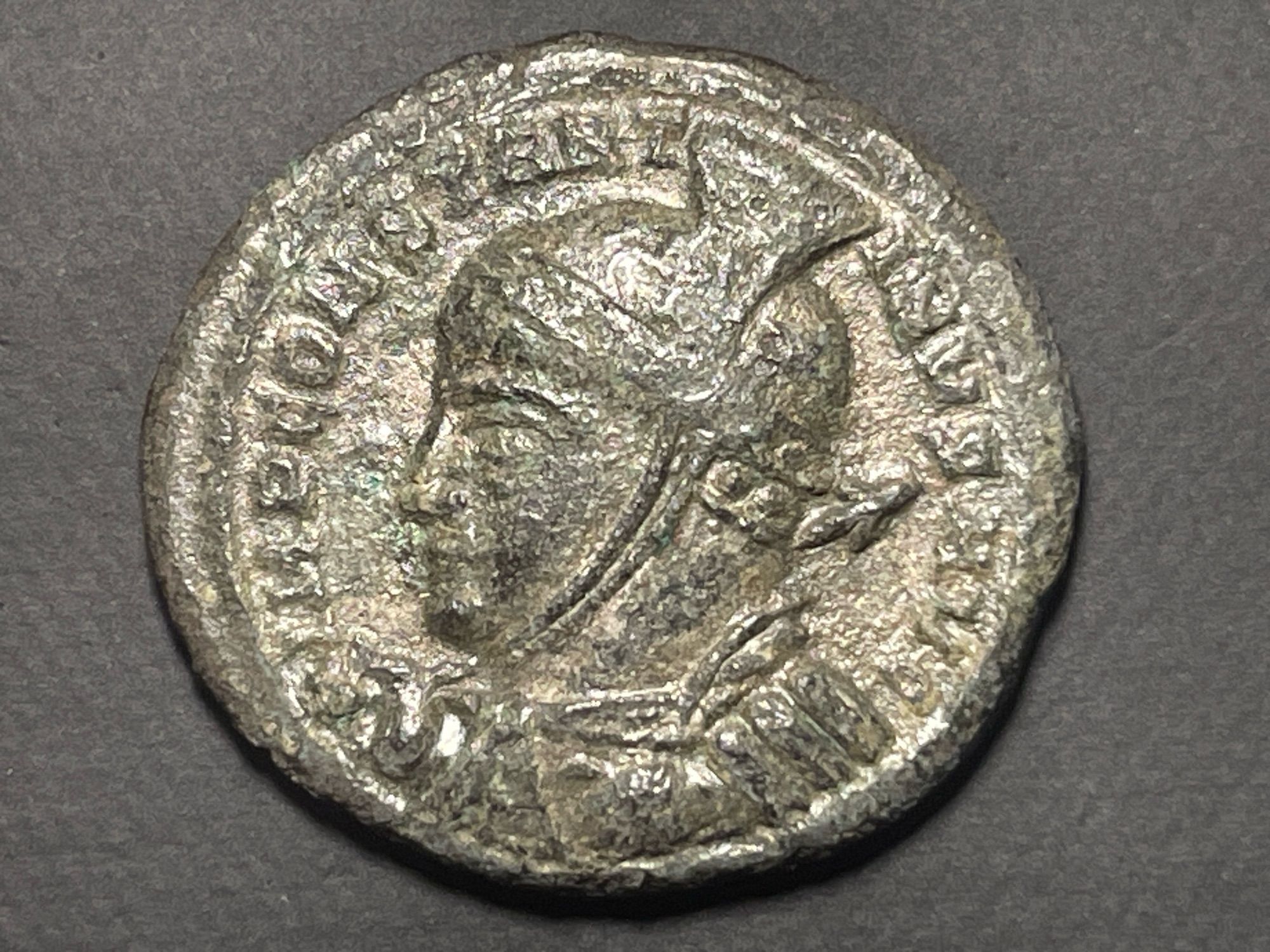 Obverse IMP CONSTANTINVS AVG
Bust of Constantine I left, wearing high-crested helmet, cuirassed, spear across shoulder