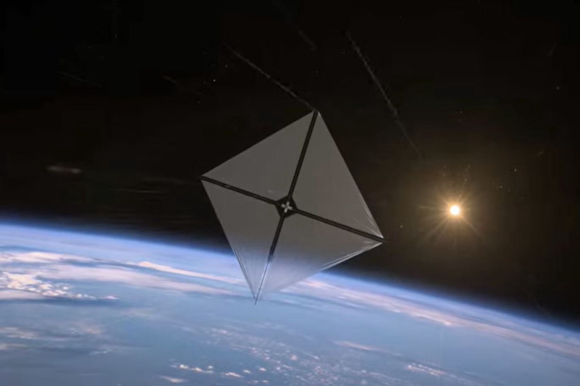 A sci-fi looking silver kite flights above the Earth in outer space with the Sun shining brightly behind it.