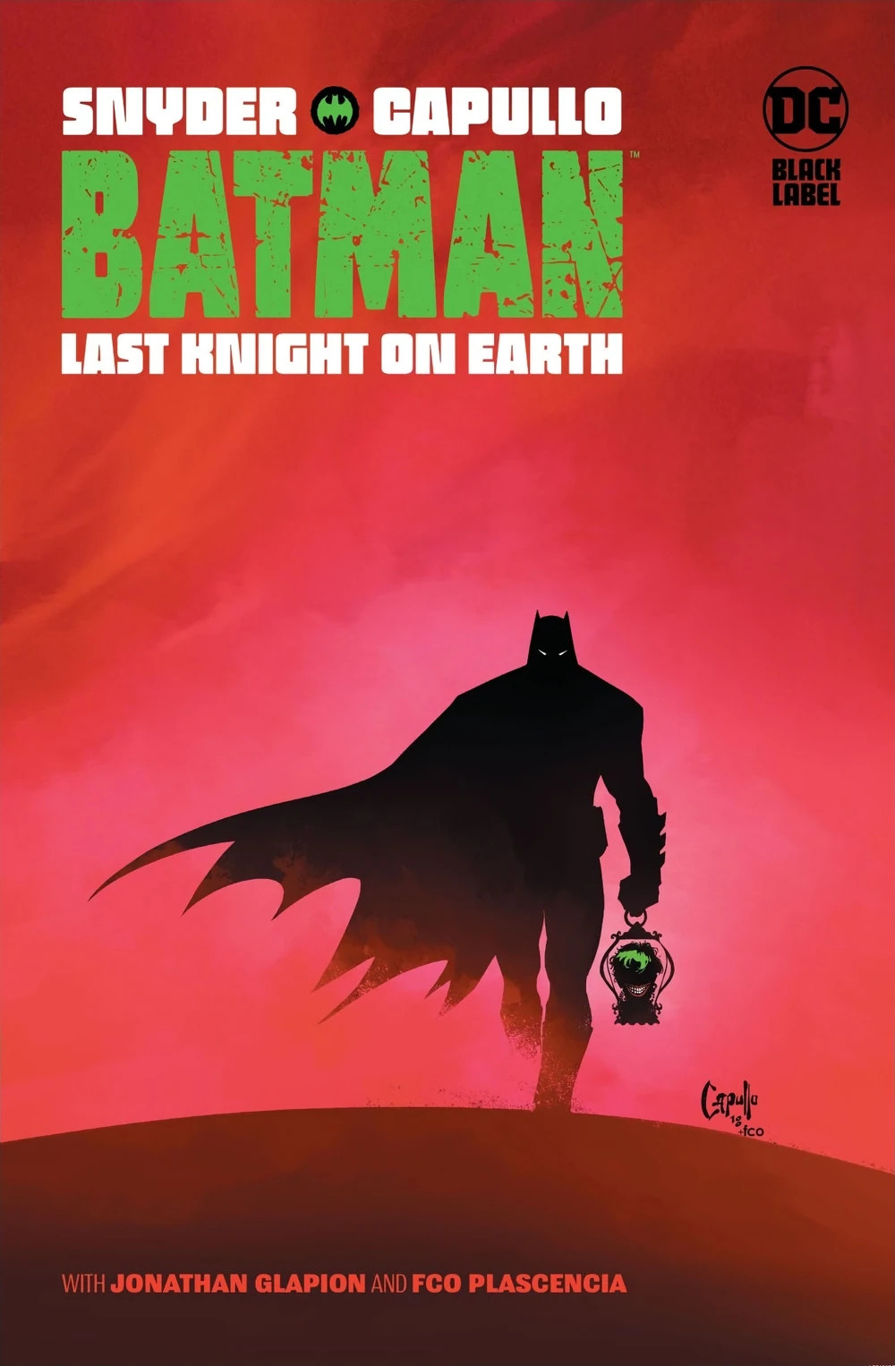 A cover of Batman: Last Knight on Earth created by Scott Snyder and Greg Capullo showing a silhouette of Batman holding a lantern with the Joker's smiling head in front of a reddish pink coloured background.