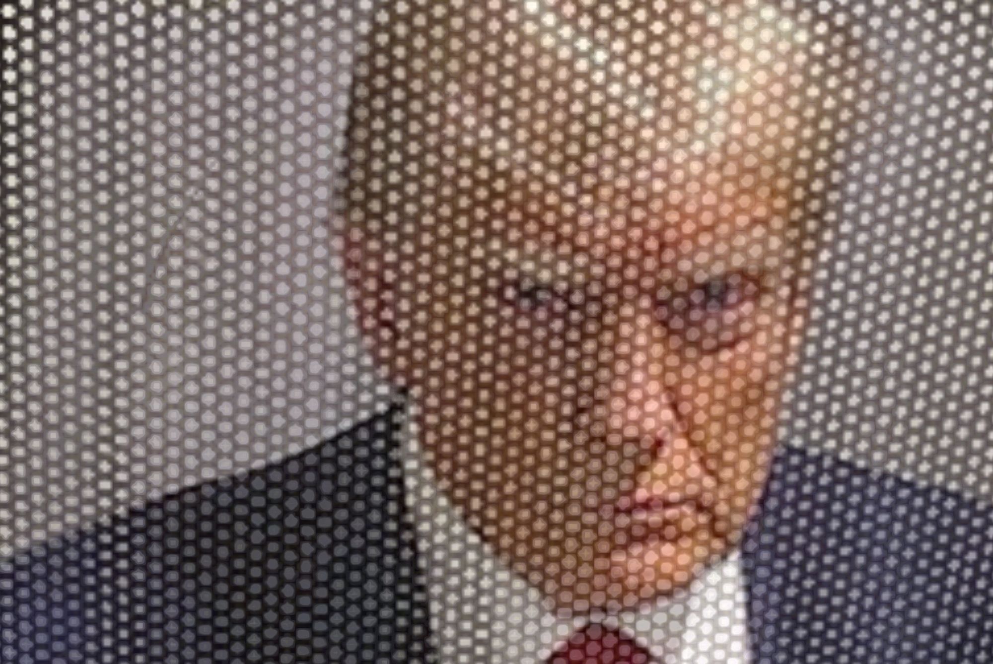 Trumps mugshot through a microwave door