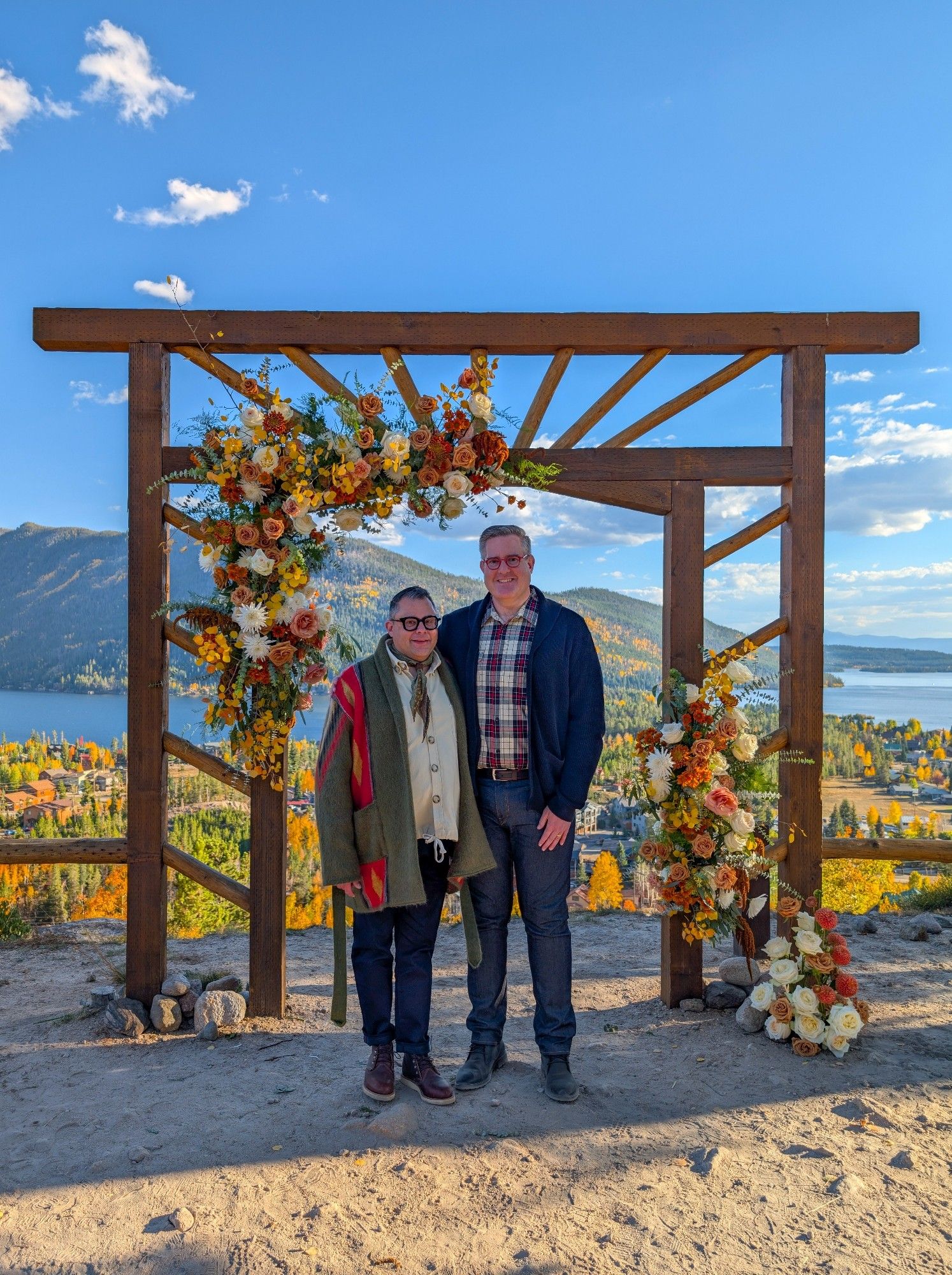 My husband and I in front of a wedding gazebo overlooking Grand Lake, Colorado