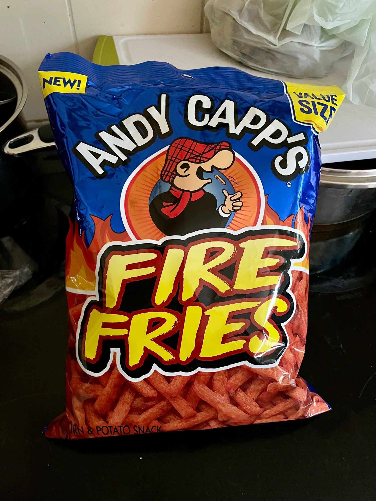 A bag of ‘Fire Fries’ crisps branded with Andy Capp, the loveable flat-cap wearing, beer-drinking, wife-beating northern stereotype whose cartoon strip has appeared in the Daily Mirror since 1957