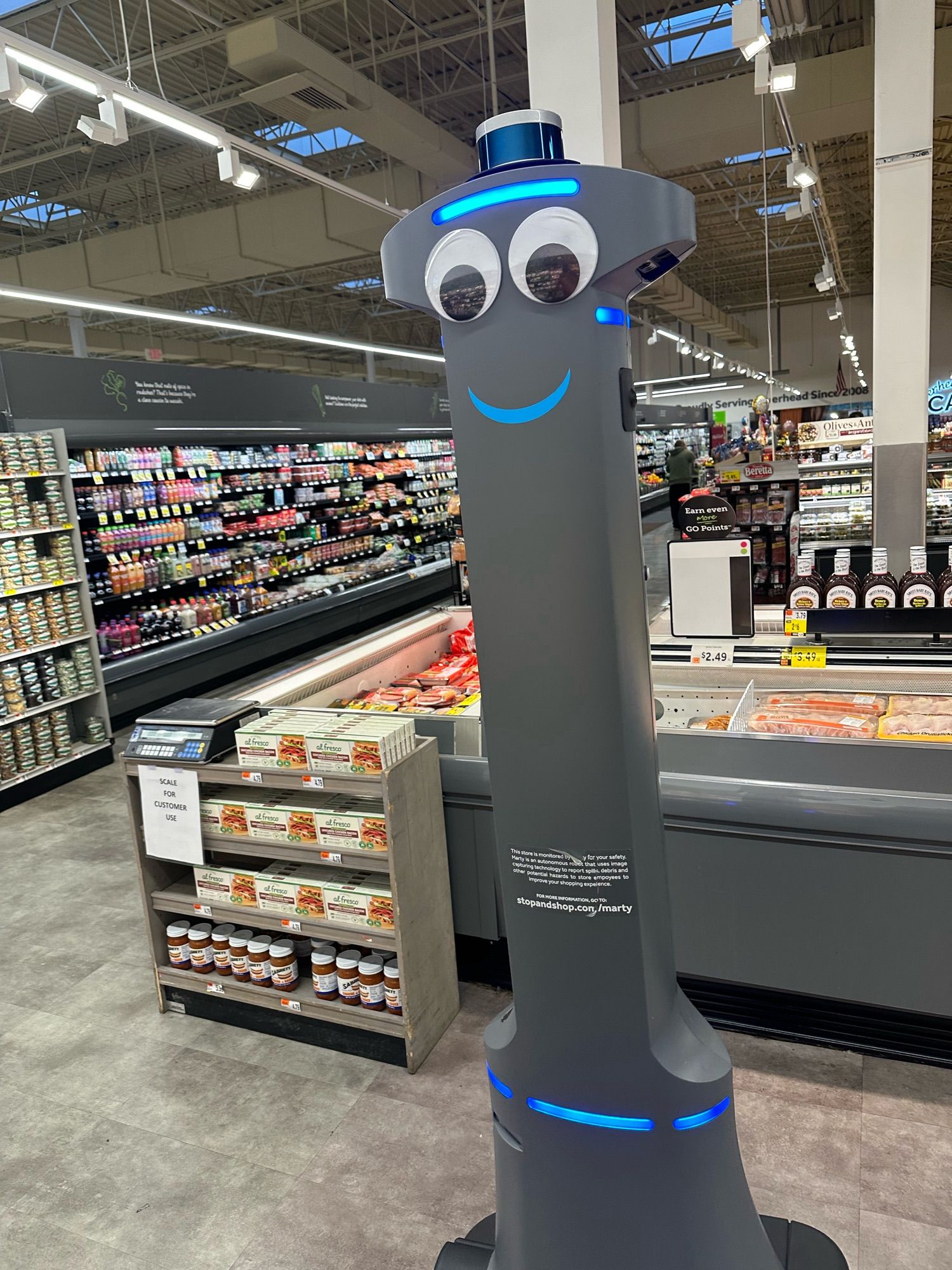 Grocery drone with googly eyes wandering the aisles