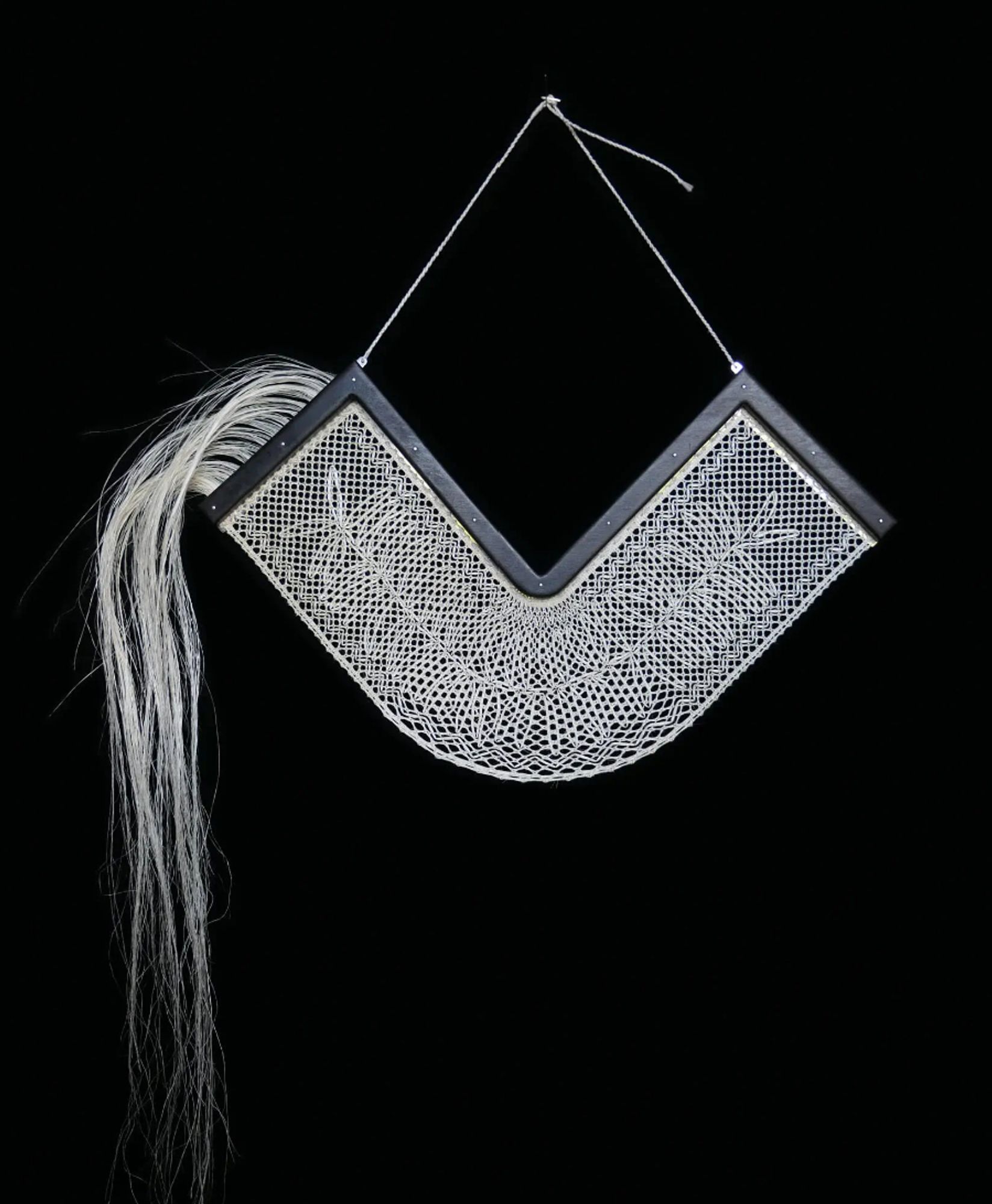 Pic of lacework made from muka (flax strands) by Rowan Panther