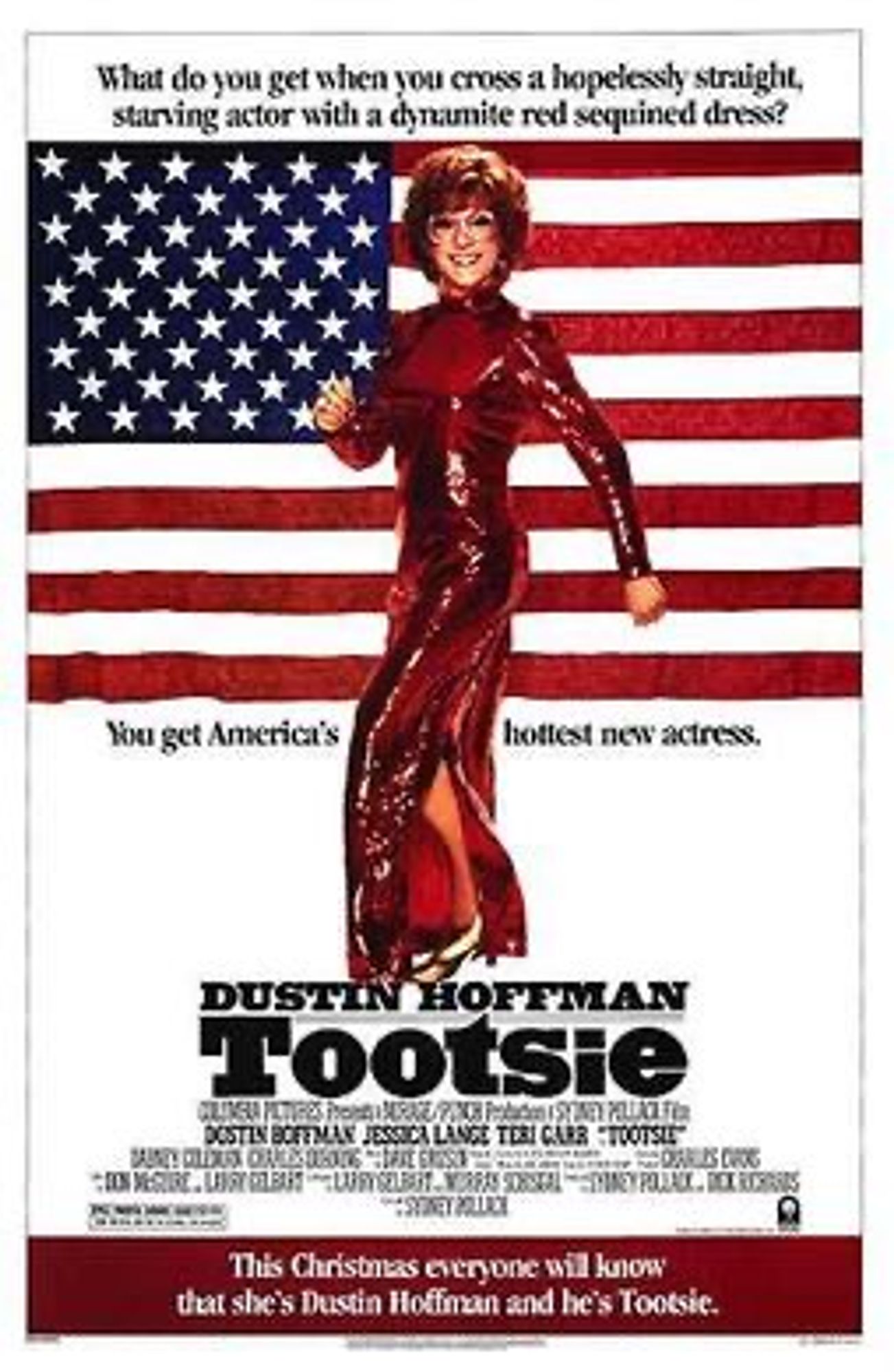 Promotional poster of Tootsie. Dustin Hoffman wears a glittery red dress and wig and is stood in front of the Stars and Stripes US flag.