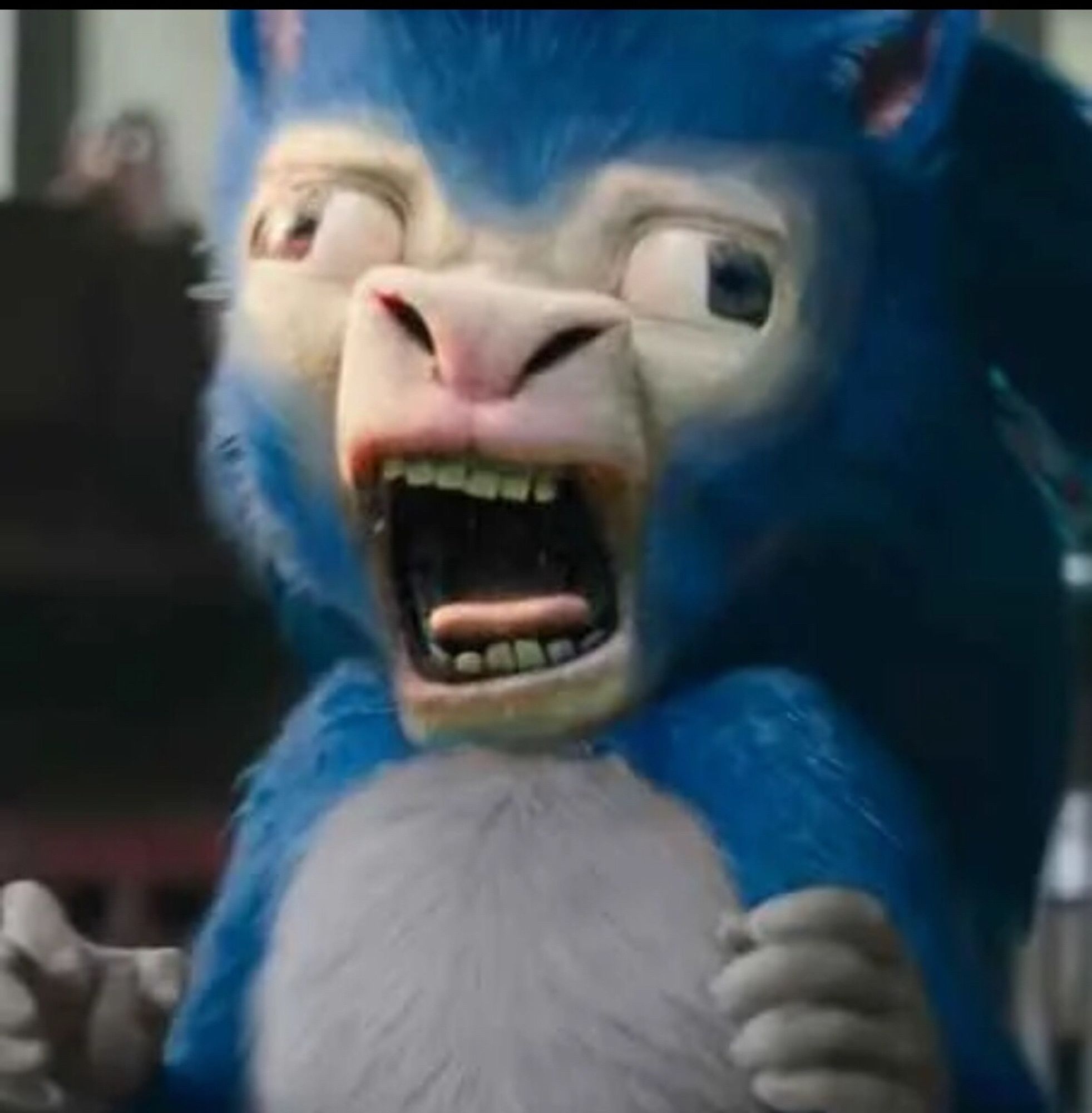 Realistic Sonic the Hedgehog weird teeth picture photoshopped together with one of the goats from the upcoming Minecraft movie and look, I dunno why either, someone’s always gonna press the big red button for the hell of it