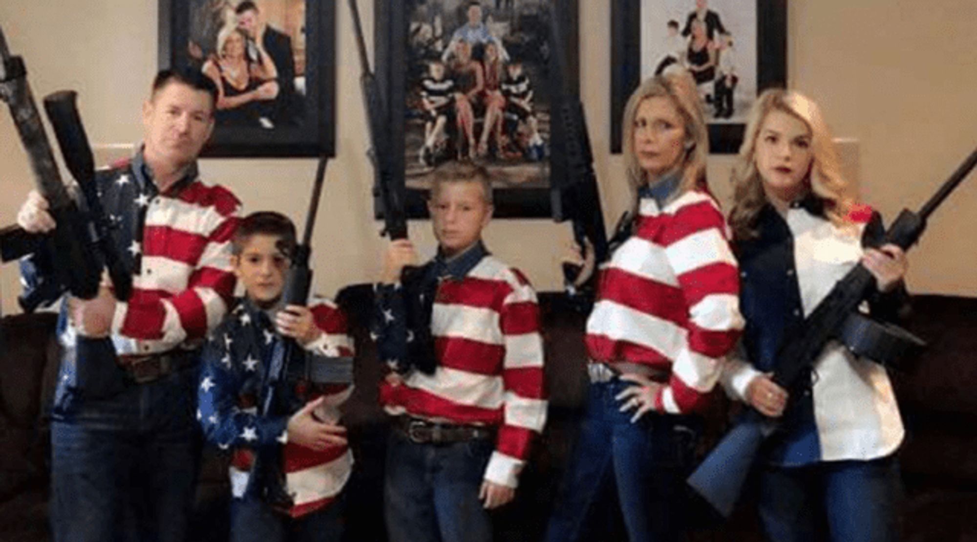 Republican pastor/chair of OK RNC in a family where they are all wearing American flag shirts, holding guns and looking "sternly" into the camera.