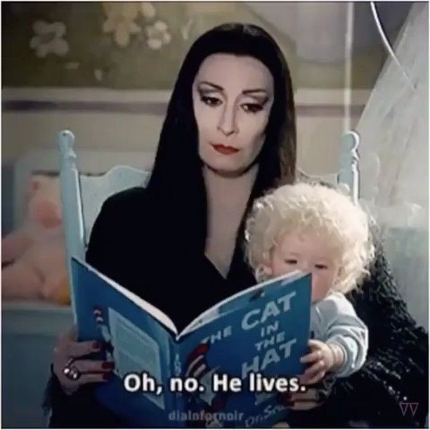 Morticia Addams (a white woman with long, straight black hair, dresses in black), reads The Cat in the Hat to her son (white boy, blond, curly hair). She looks disappointed as she says, "Oh no. He lives."