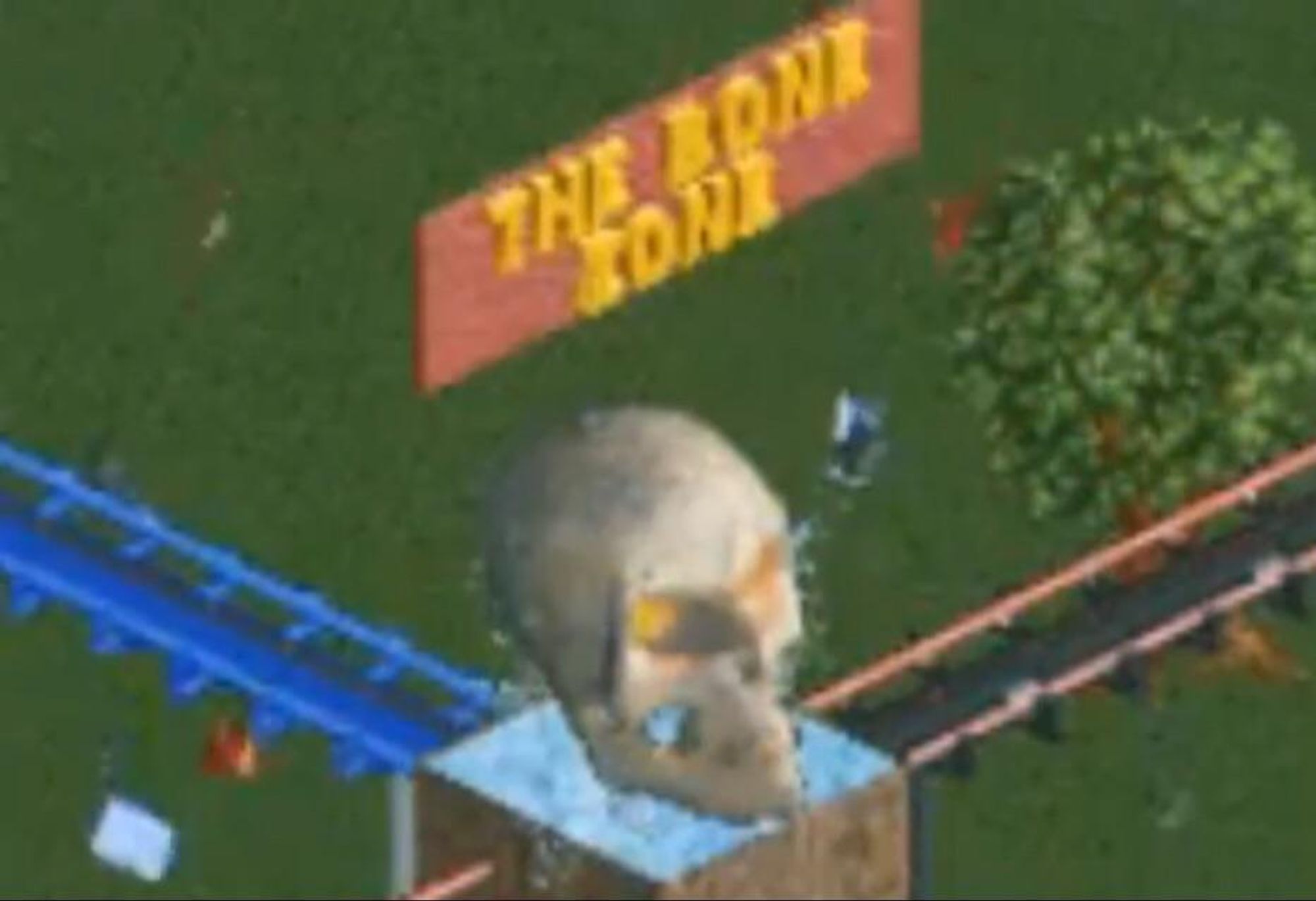 Screencap of roller coaster tycoon with a sign that says "The Bone Zone".