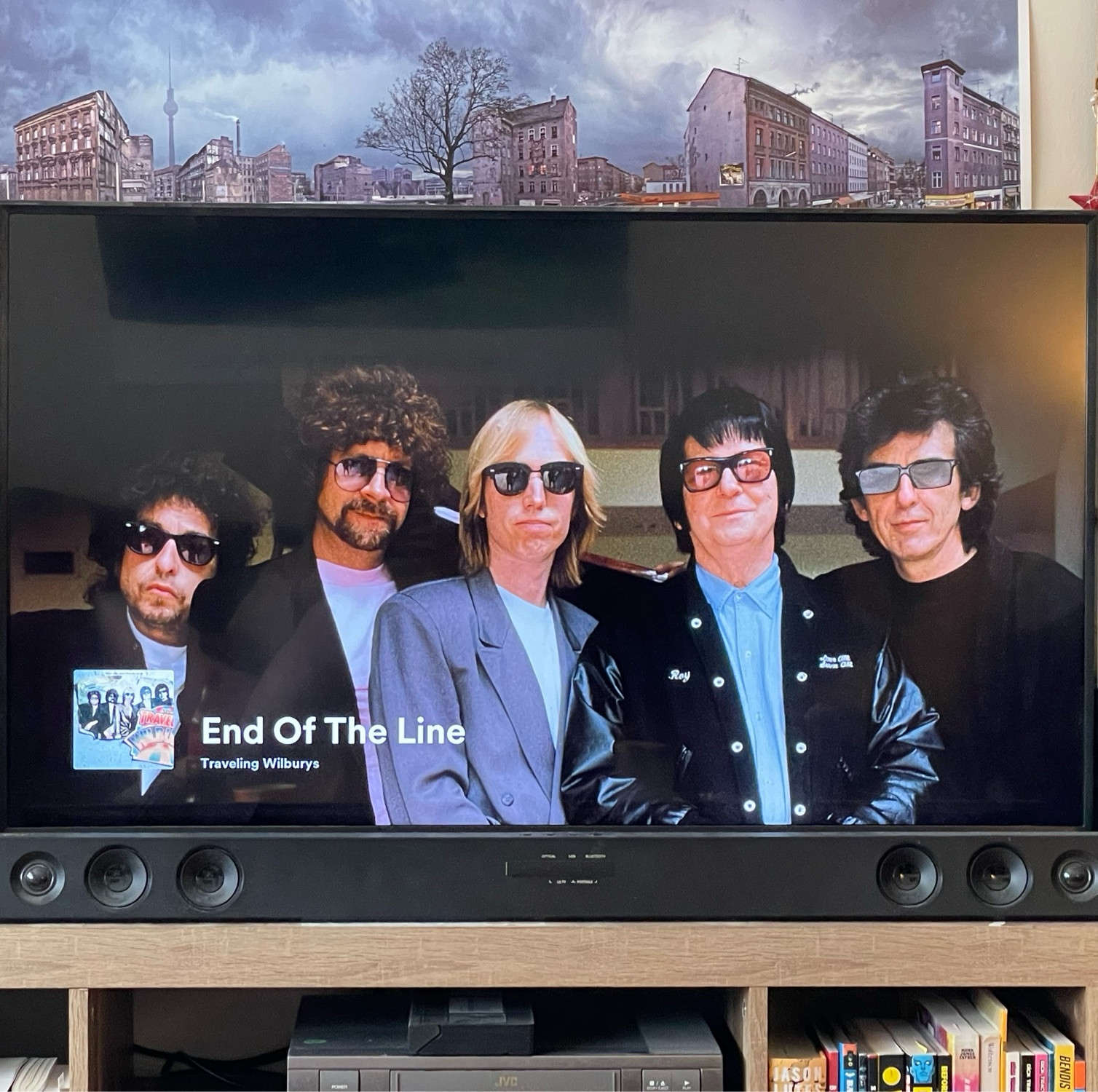 spotify's photo of the traveling wilburys. bob dylan looks like he's only just made it into the photo, like he's leaning into it, while the other members are all standing straight.