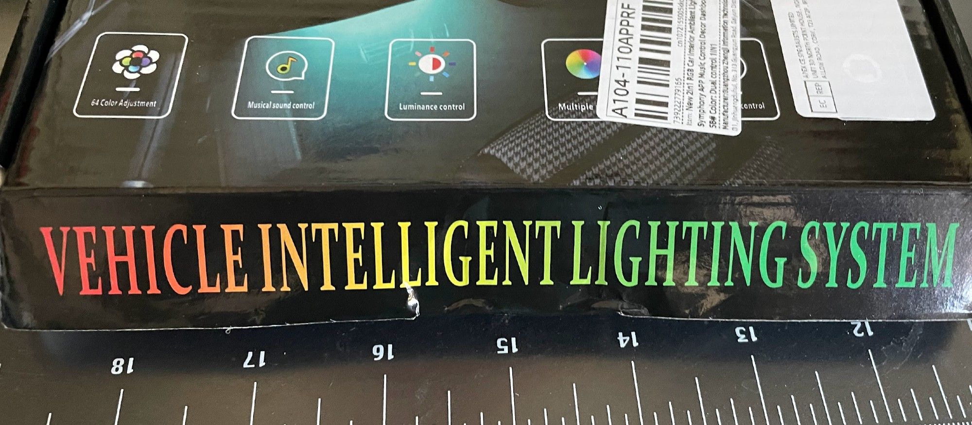 small black cardboard box labelled: vehicle intelligent lighting system.