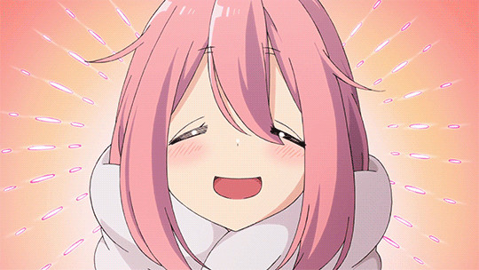 Happy smiling Nadeshiko Kagamihara from Yuru Camp! She has pink hair and wears a fluffy white scarf.