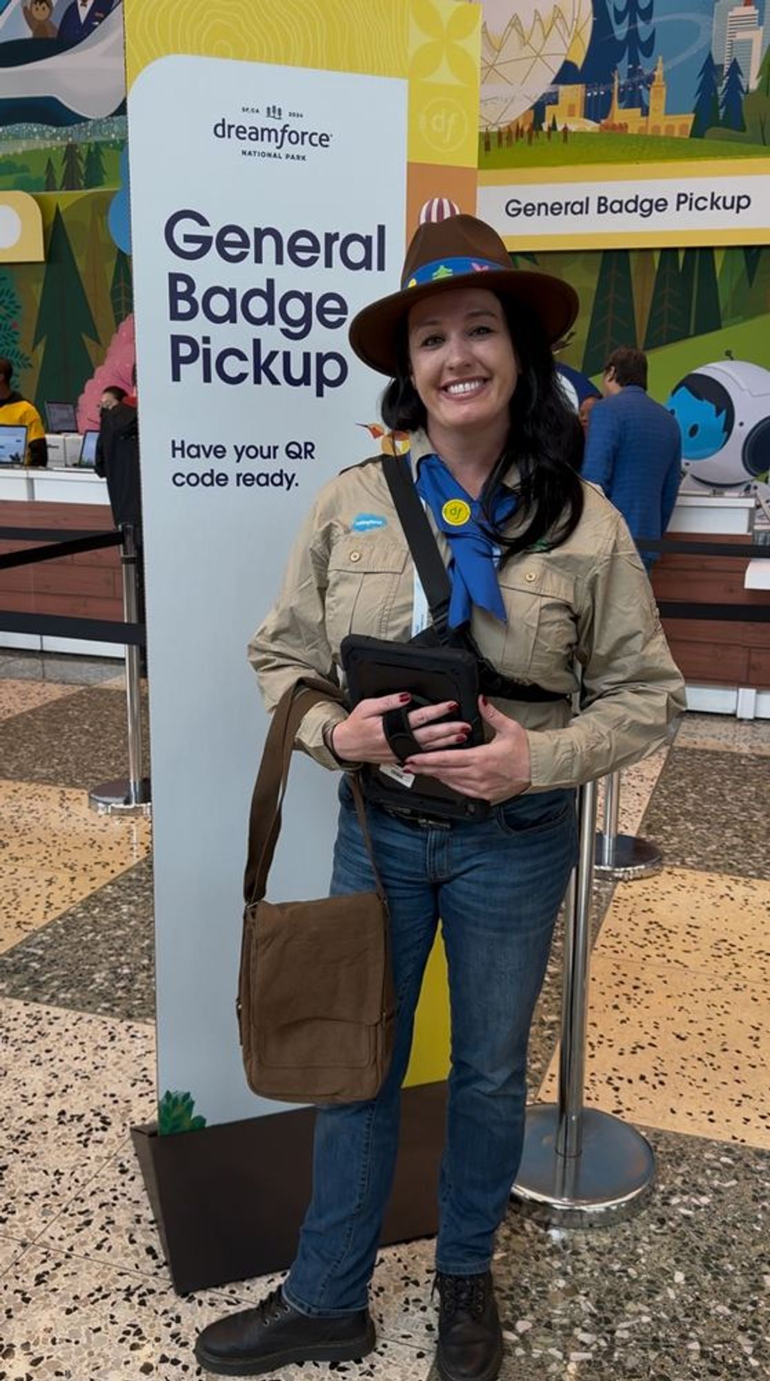 A helpful guide is smiling, dressed as a ranger. These individuals were thought the entire campus providing assistance with any question you might have. 