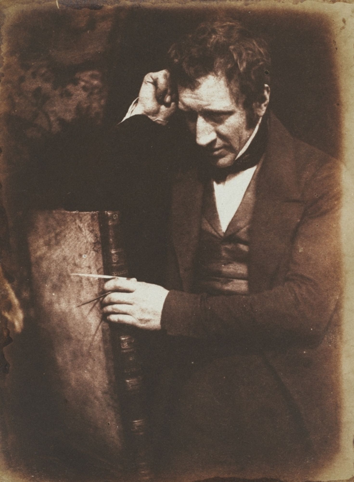 Among the earliest photographers to explore both the artistic and societal possibilities of the portrait were the painter David Octavius Hill and engineer Robert Adamson, partners for just three years before Adamson’s death. Elizabeth Rigby<em>,</em>seen here at age 35, went on to marry Sir Charles Eastlake and, in 1857, to write one of the first histories of photography as a fine art. James Nasmyth, an engineer who developed the steam hammer, holds a compass. Hill and Adamson often shot outdoors because bright sunlight allowed shorter exposure times. They subordinated the background in shadow and bathed the important details of the face and finery in areas of light.