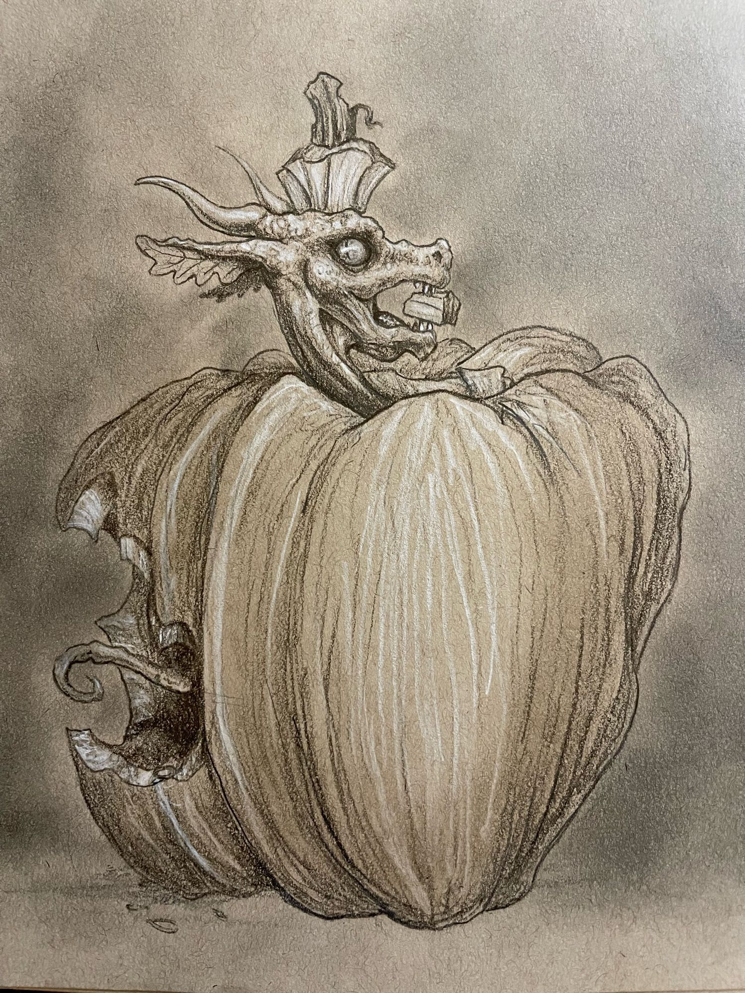 Drawing of a tiny dragon with leafish ears, popping out of the top of a pumpkin it is eating.