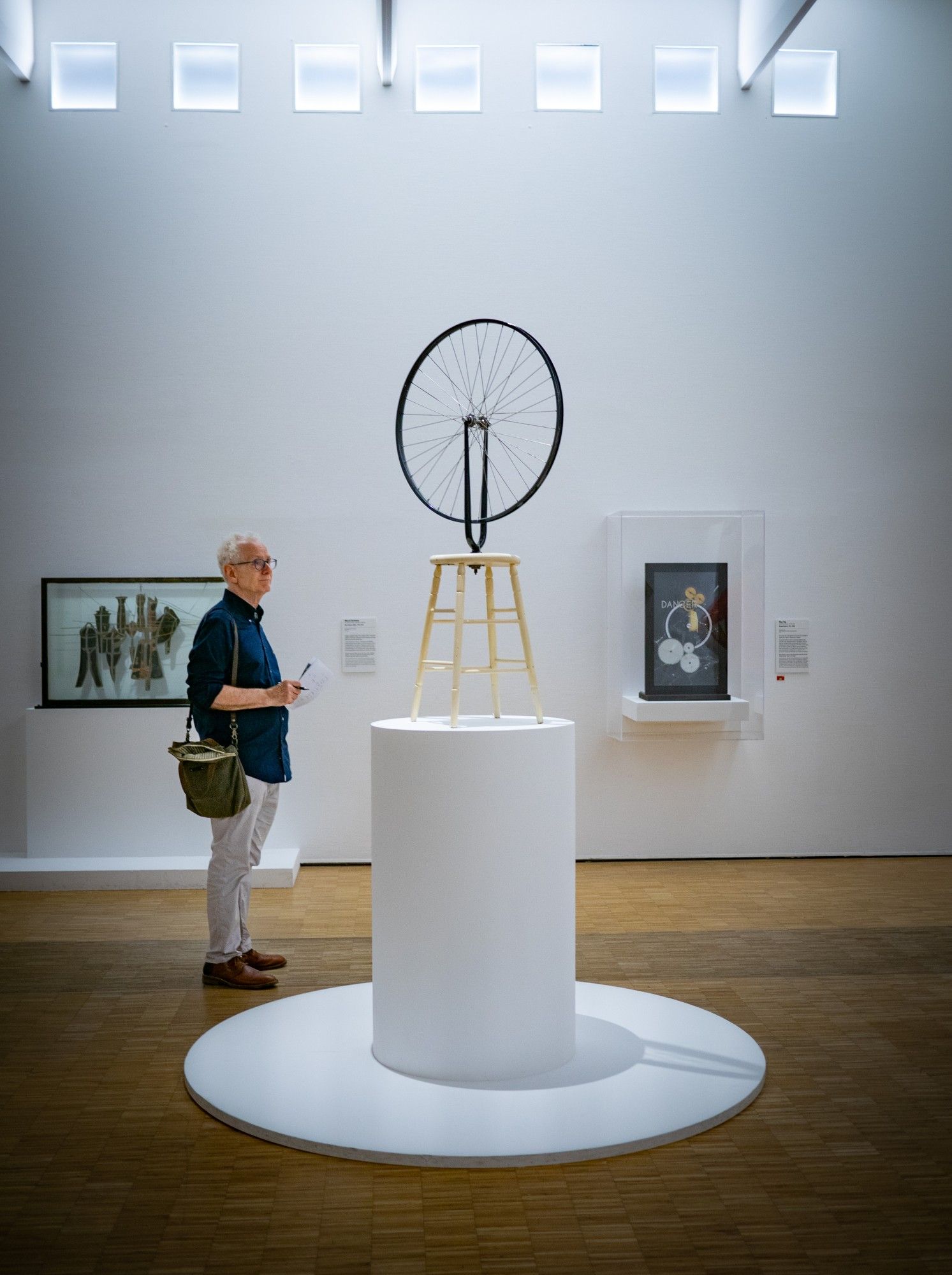 Person looking at art installation in gallery