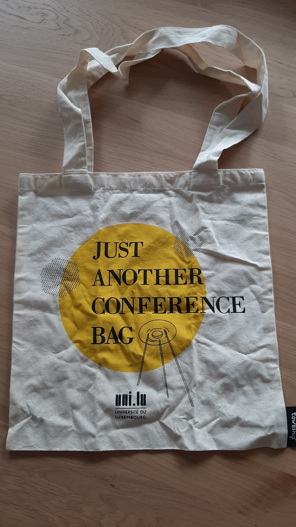 Tote bag trom the University of Luxembourg, reading:" just another conference bag"