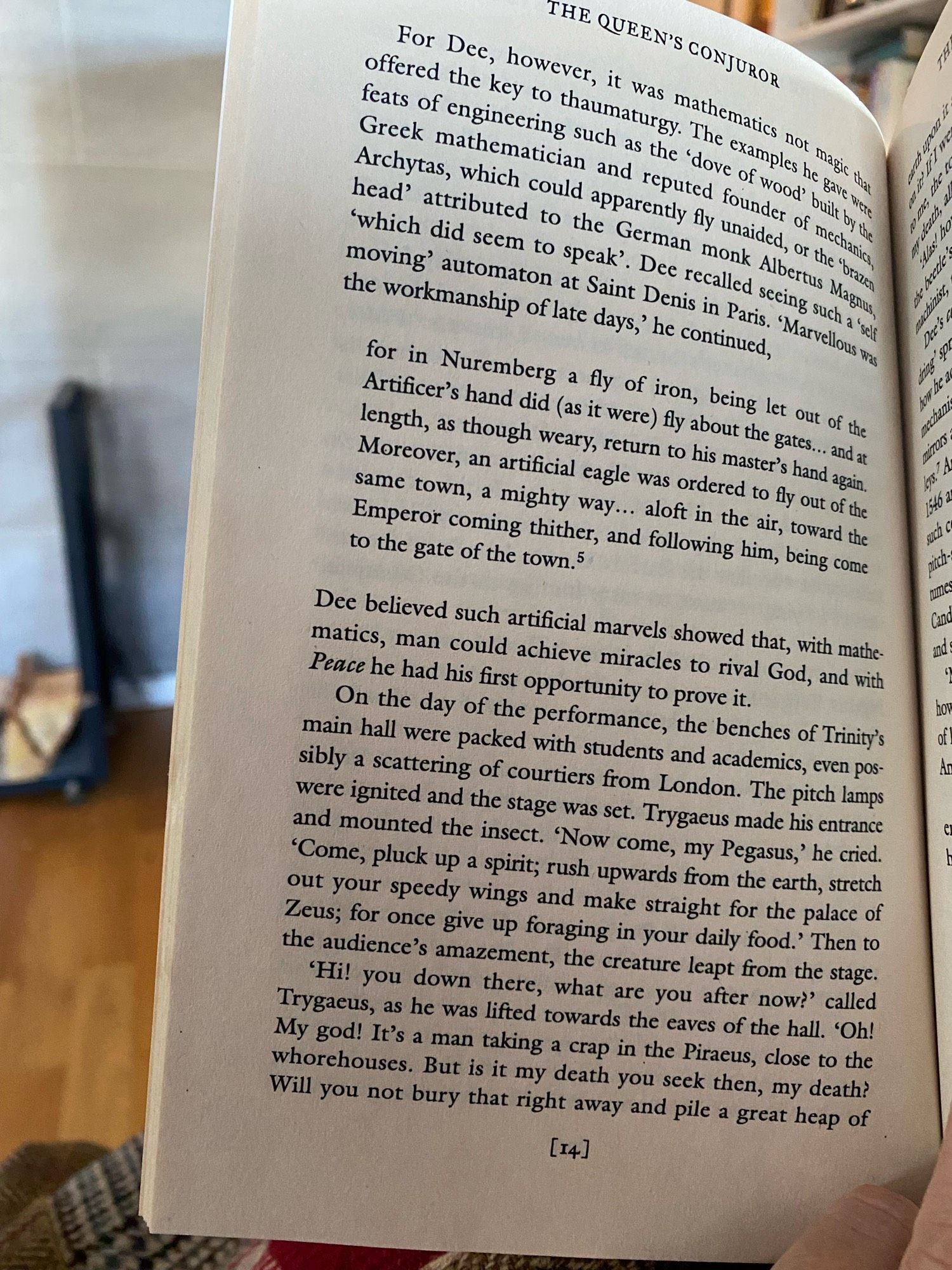 The text is too long for alt text. In brief, Dee staged Aristophanes’ Peace, where a man flies on ghe back of a scarab. It was staged in Trinity main hall, in front of students and academics. The scarab lept from the stage, and Trygaeus was lifted to the eaves of the hall.