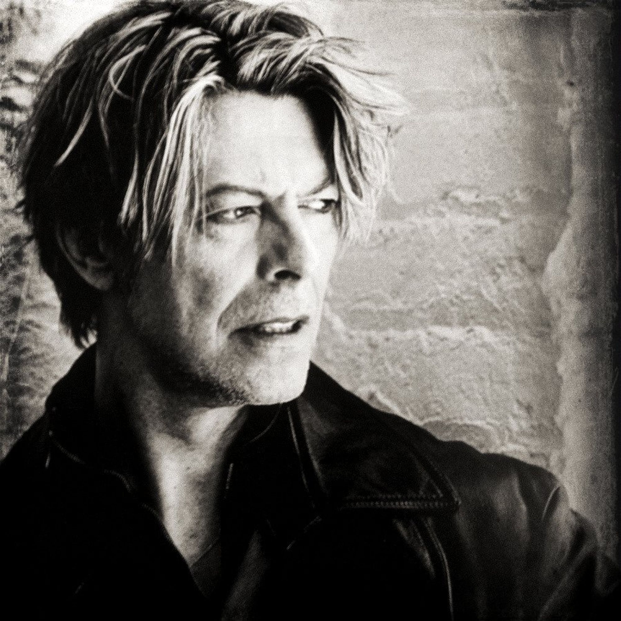 black and white picture of david bowie looking off into the distance like a movie star 

"i'm always amazed that people take what i say seriously. i don't even take what I am seriously."