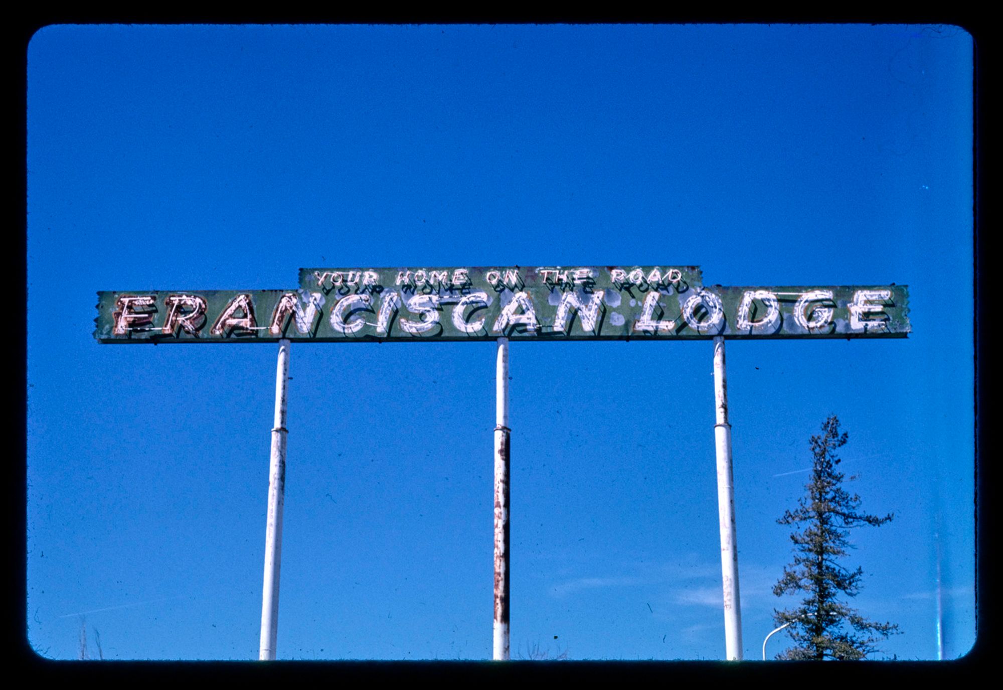 franciscan lodge sign, grants, new mexico, 2003