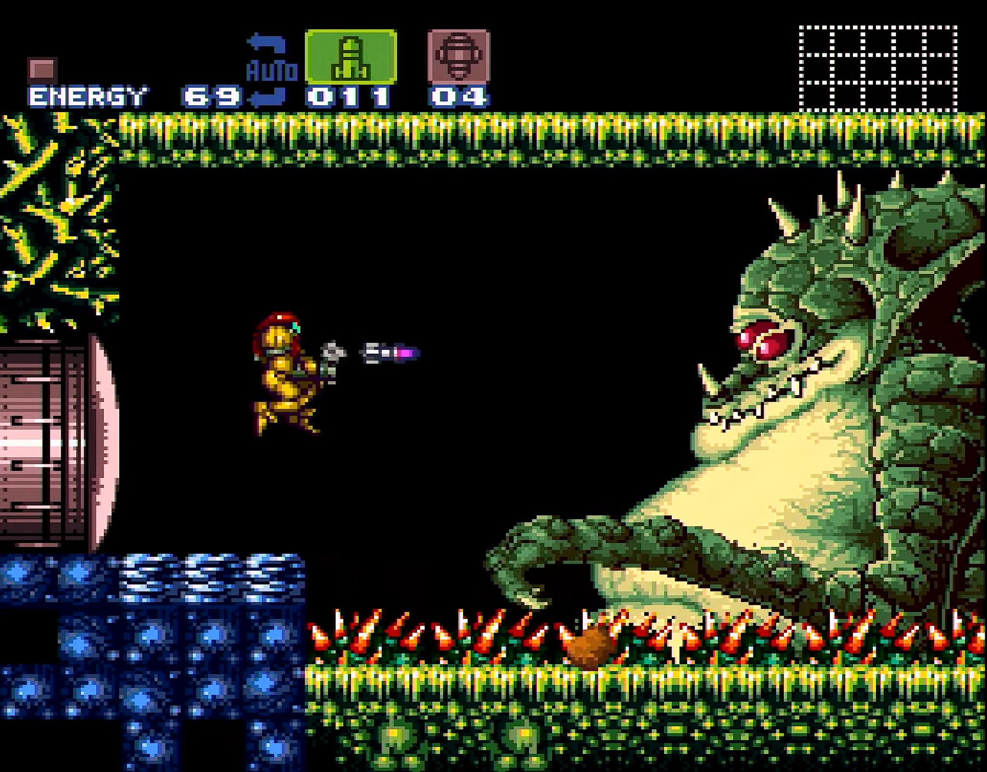 A screenshot from Super Metroid where Samus is fighting a giant Kraid.