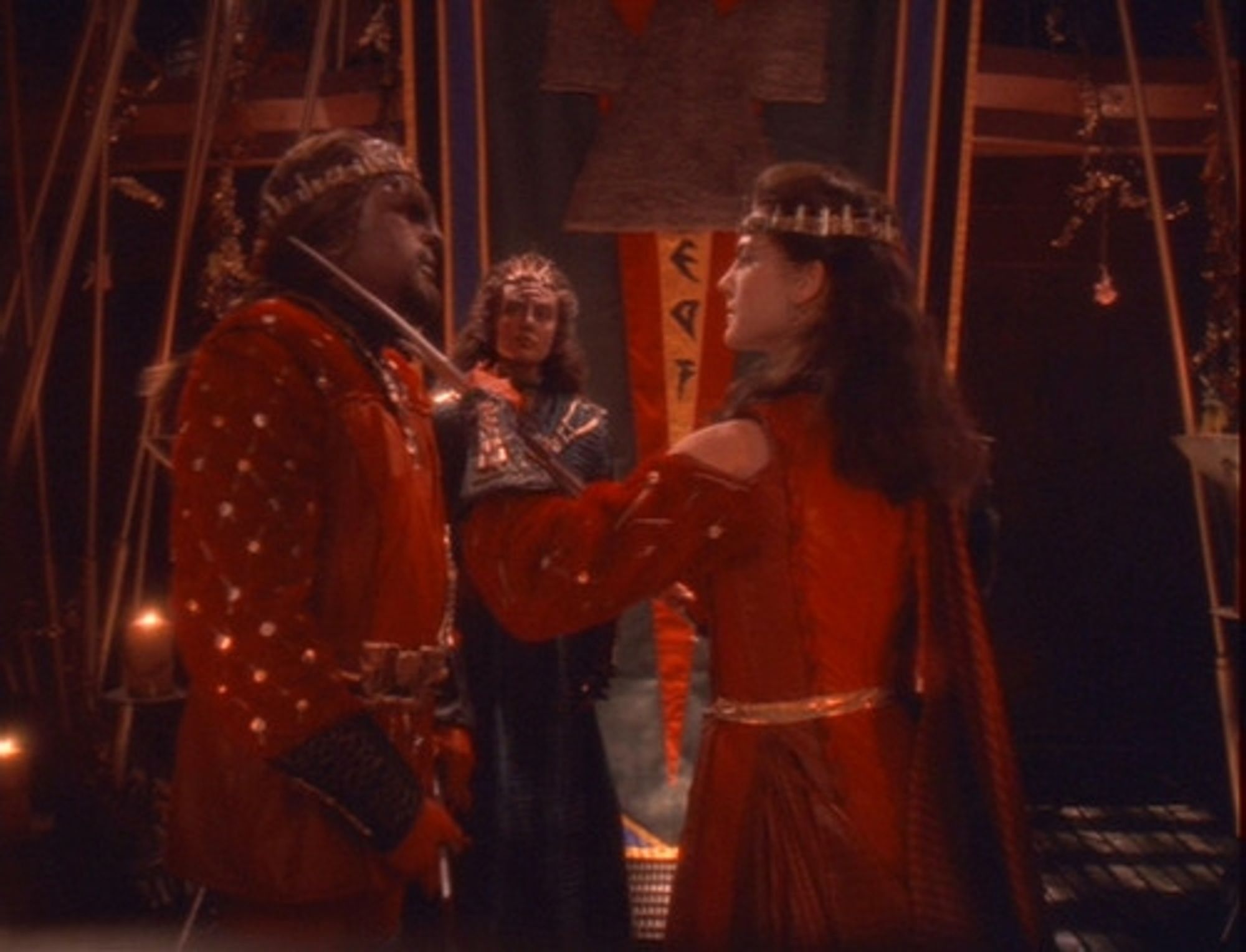 Dax has a Klingon Bat'leth to Worf's throat. I'm pretty sure she lets him go. DS9