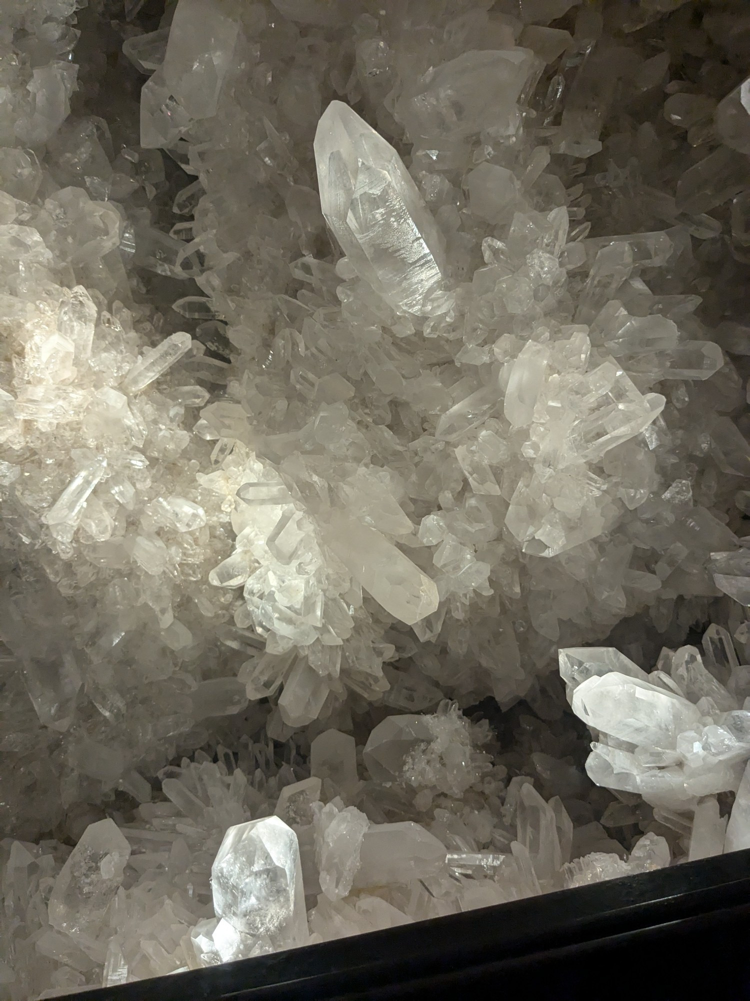 a wall of clear white quartz crystals