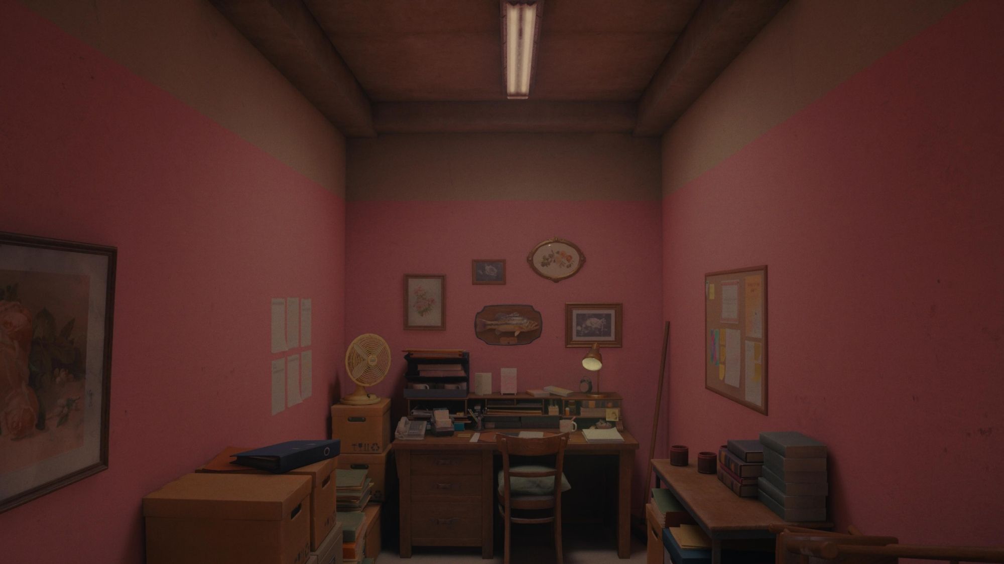 Screenshot of Alan Wake 2 Night Springs, a pastel pink storage closet with a novelty singing salmon as a centerpiece.