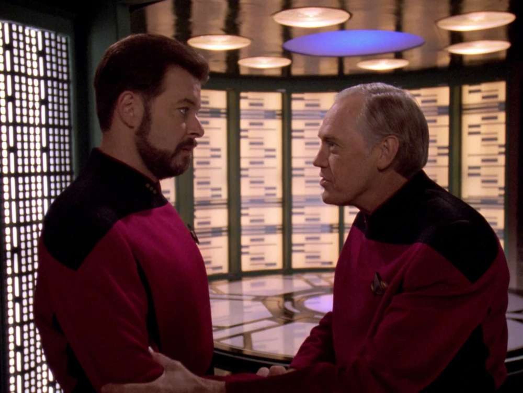 Riker and Jellico in the transporter room.