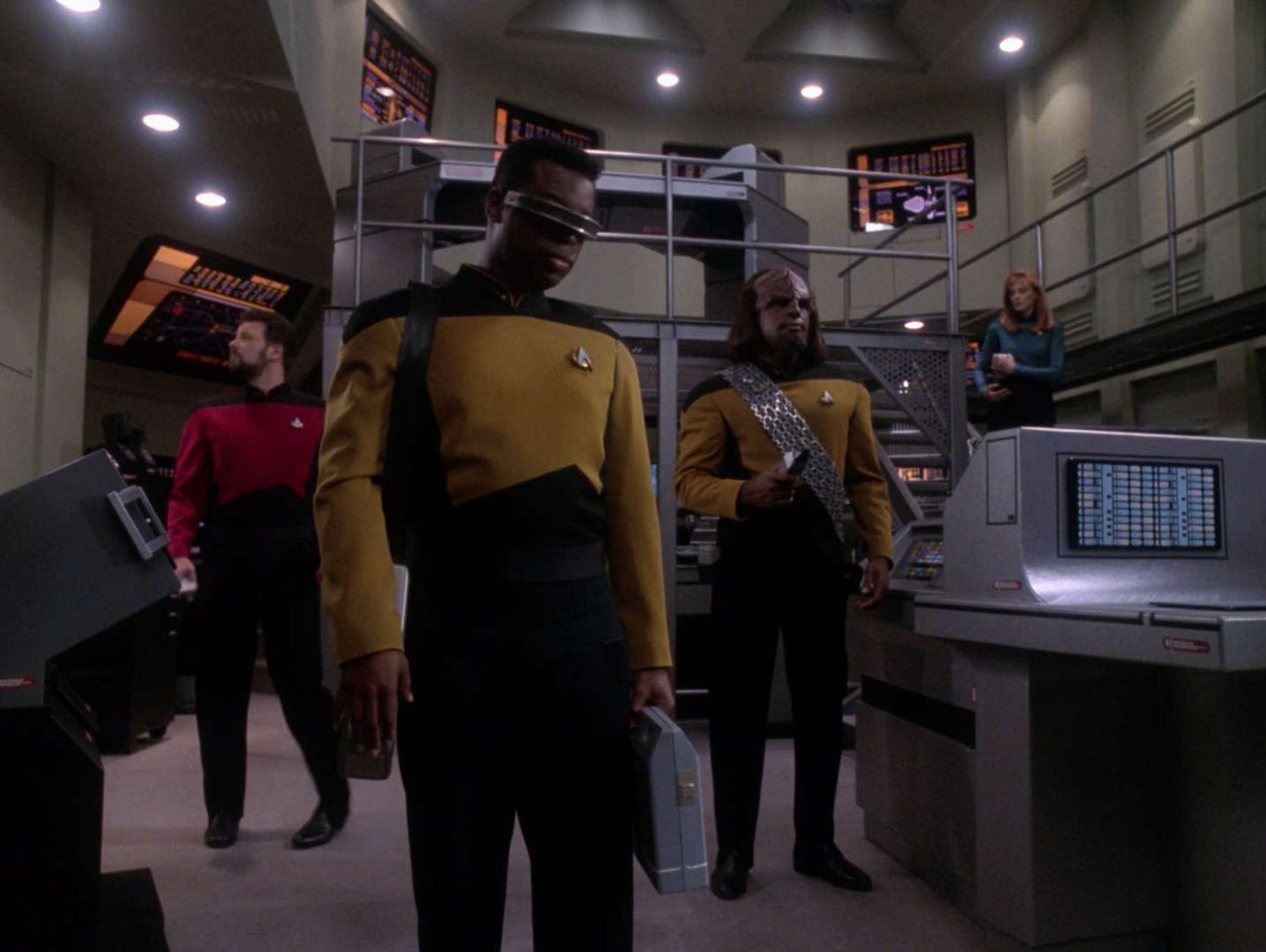 Crusher, Geordi, Riker and Worf investigate an abandoned Federation station