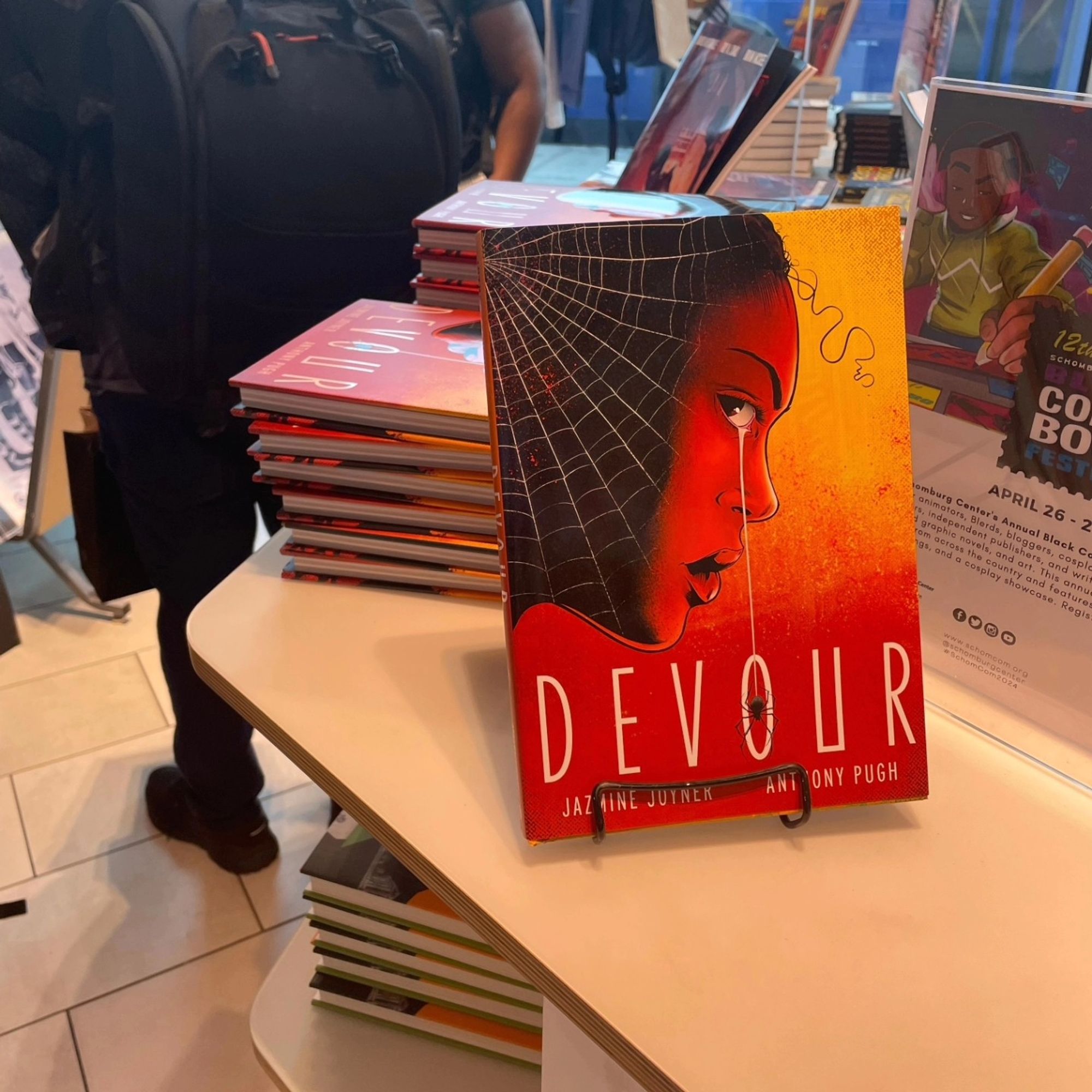 Copies of Devour at a bookstore on display