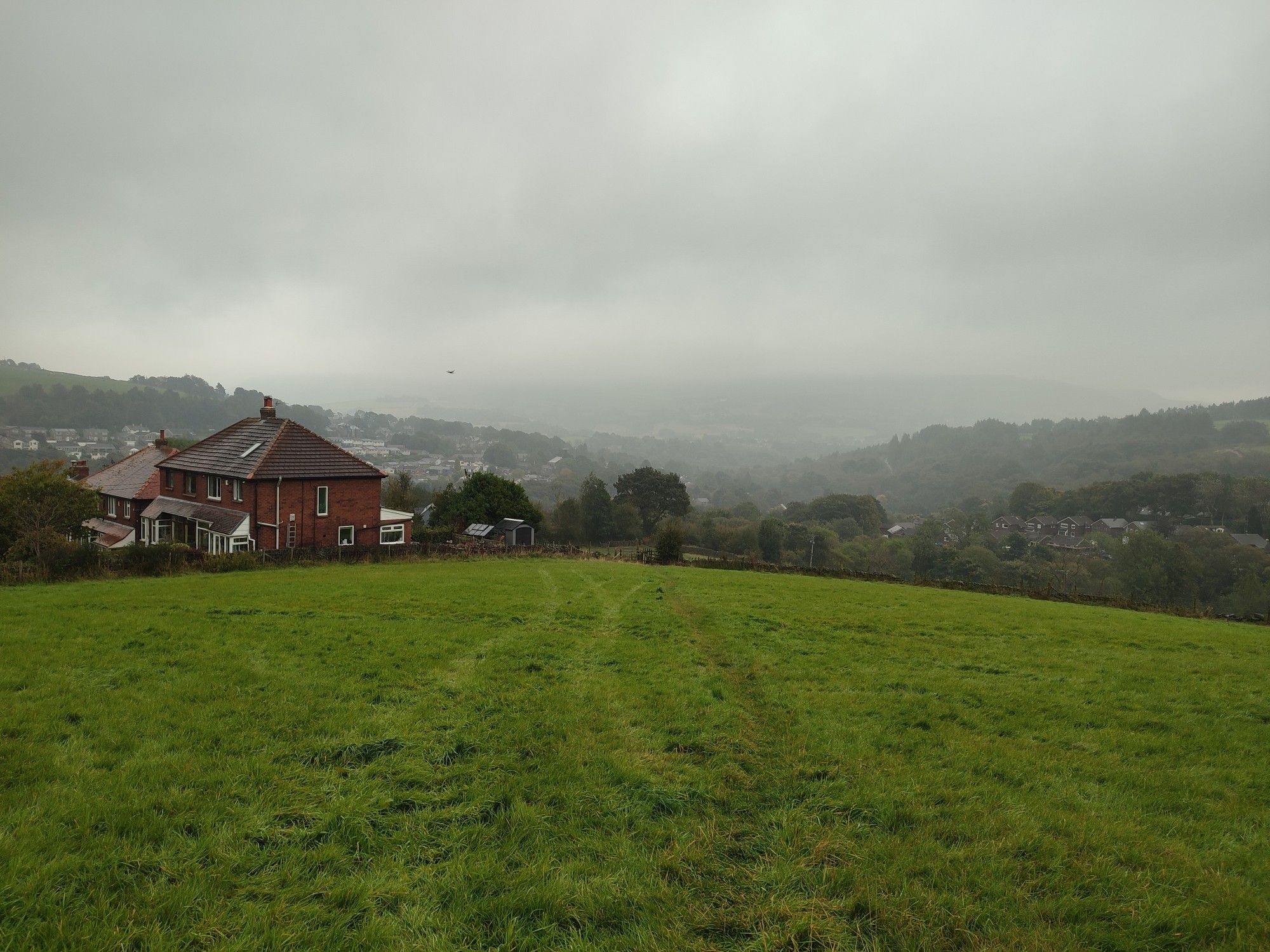 A view across Dobcross, Saddleworth with very low mist