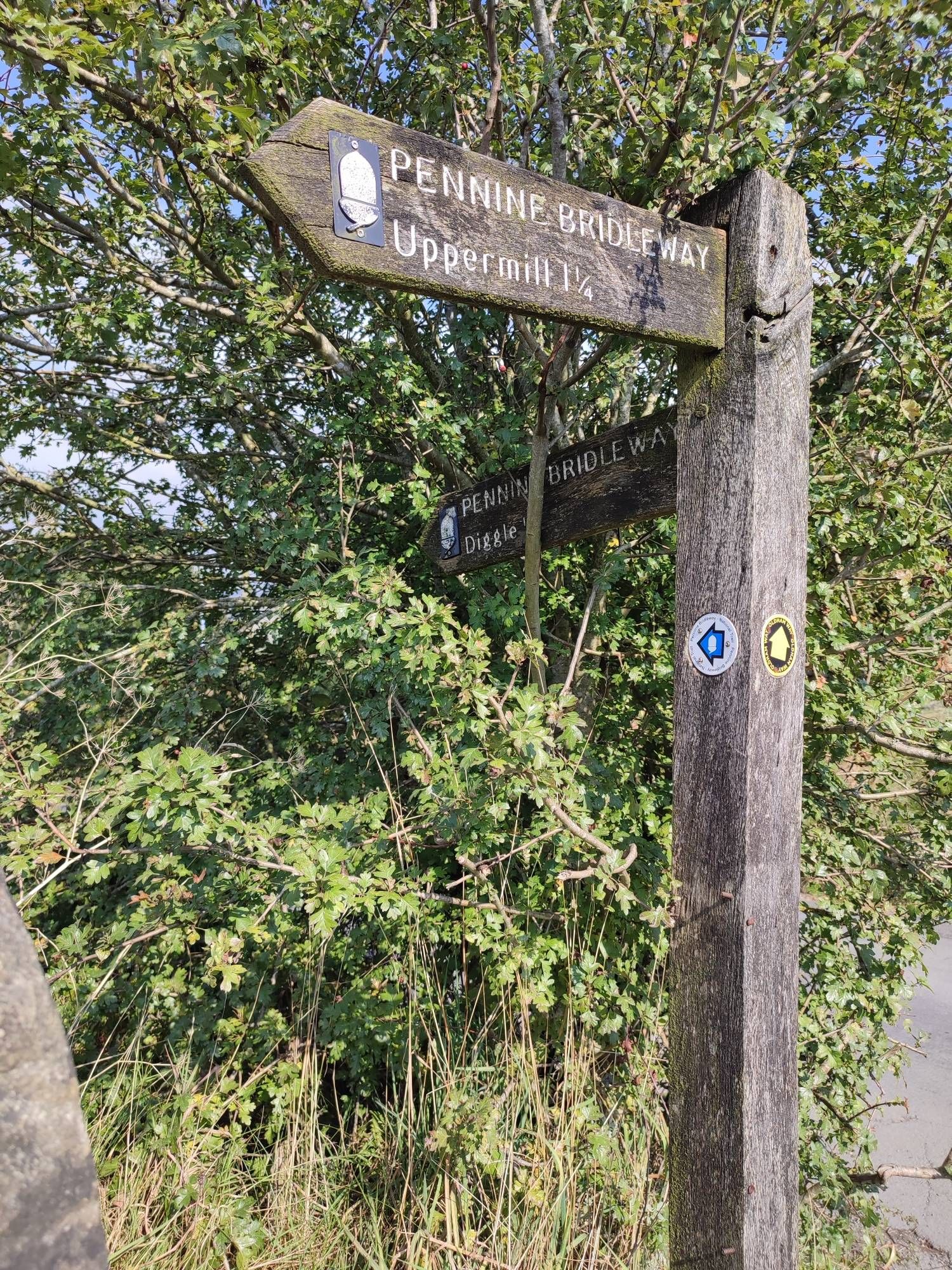 Wooden signpost for the Pennine Bridleway, Diggle, Saddleworth