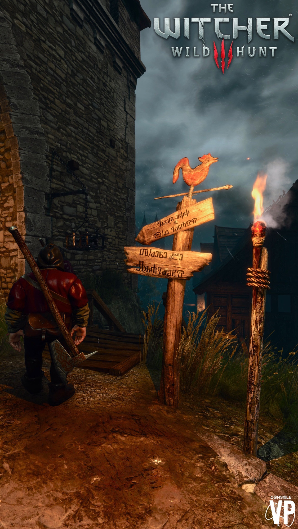 Image shows a Dwarf walking past a signpost illuminated by the warm golden glow of a burning wooden torch as dusk falls upon a small township in the game “The Witcher 3” as captured by the Virtual Photographer known as “Console VP”.