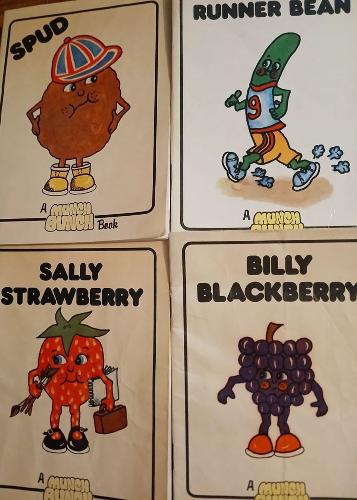 A photograph of 4 The Munch Bunch books titled Sally Strawberry, Billy Blackberry, Spud & Runner Bean, bought from a charity bookshop.