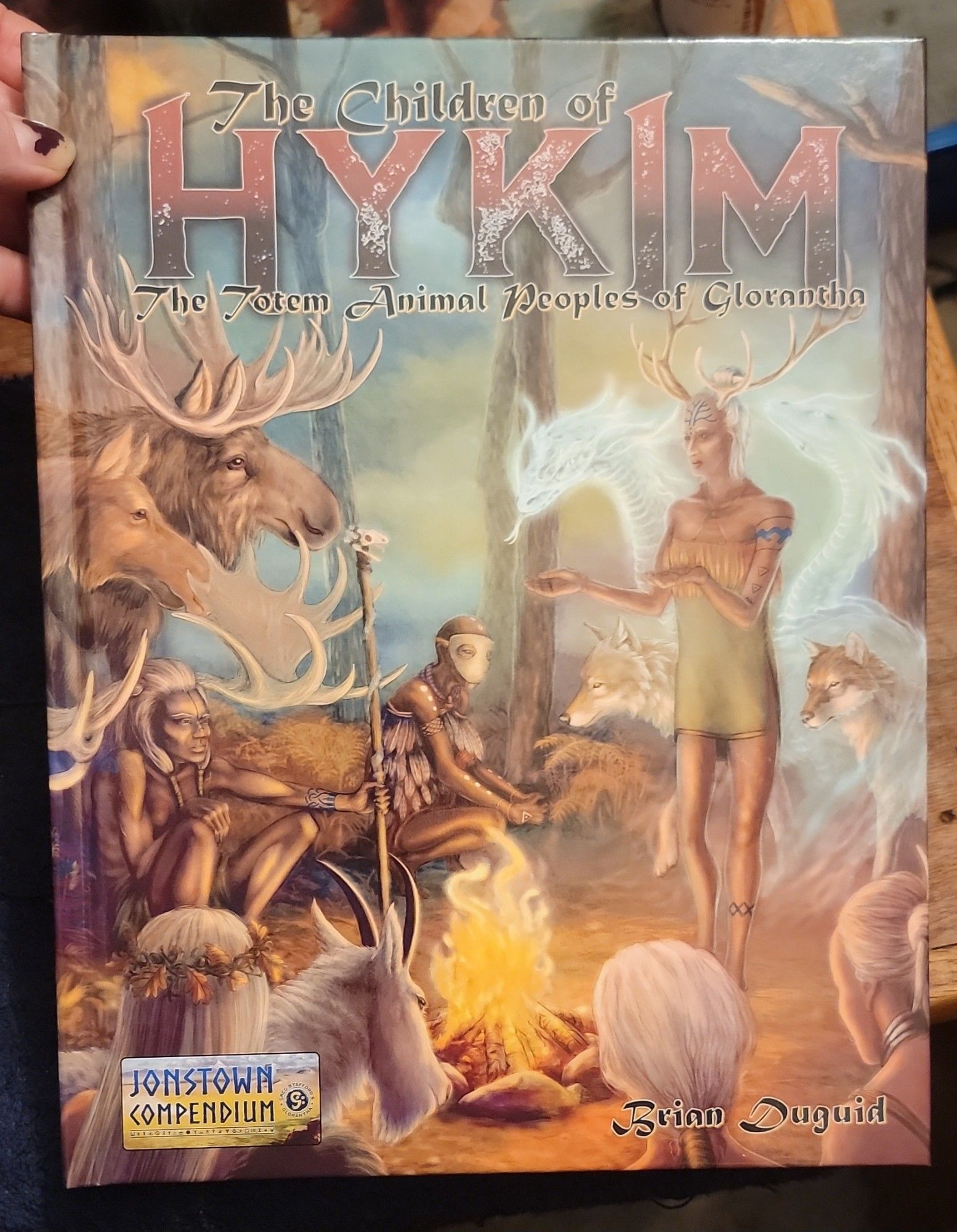 A picture of a cover of a book called The child of hykim, featuring a lithic culture engaged in some sort of ritual