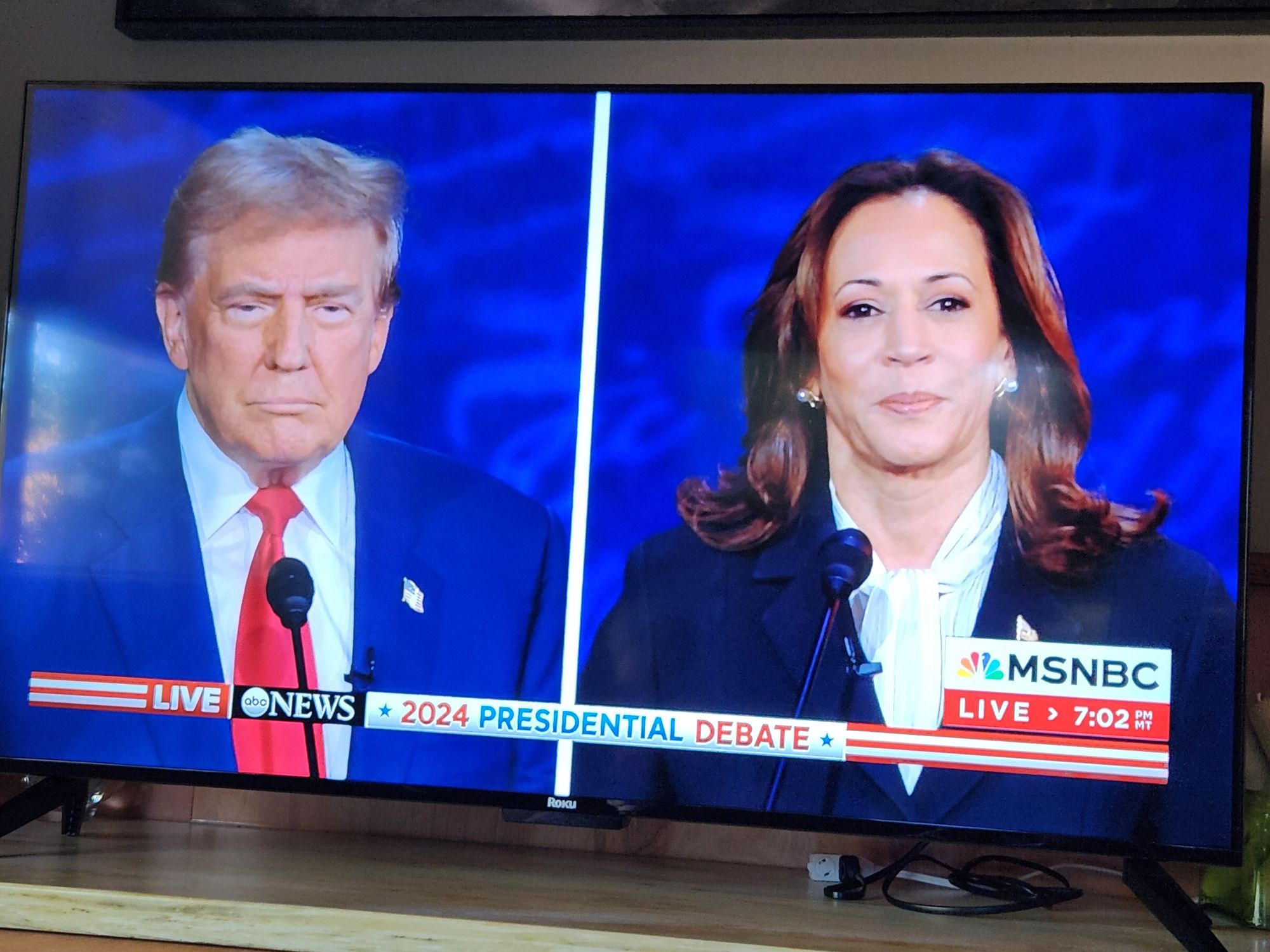 TV image of Trump and Harris at debate.