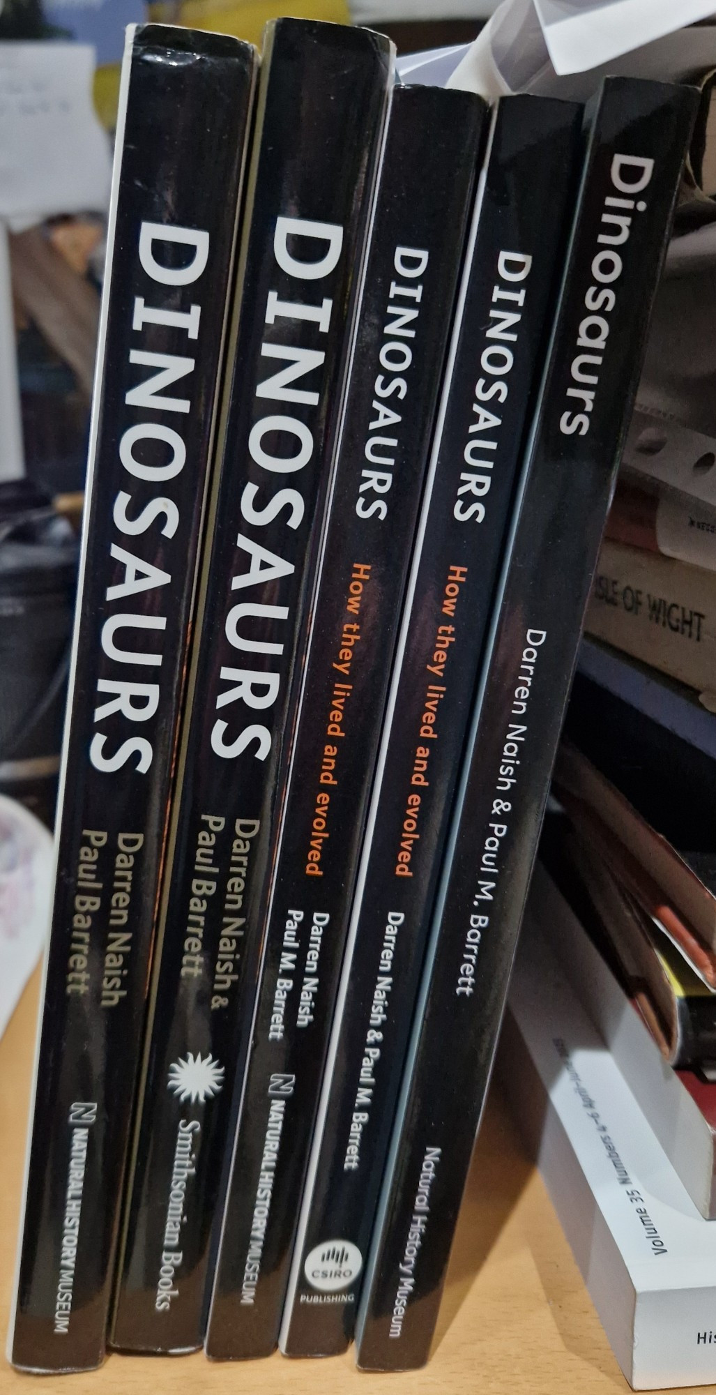 Different editions of DHTLE, showing spines alone