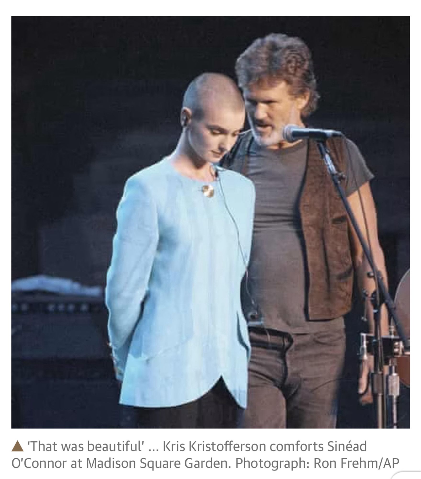 Pic of Kristofferson with Sinead O’Connor; caption “‘That was beautiful’… Kris Kristofferson comforts Sinead O’Connor at Madison Square Garden. Photograph: Ron Frehm/AP.” From https://www.theguardian.com/music/2023/jul/27/sinead-oconnor-ripped-up-the-popes-photo-on-tv-snl