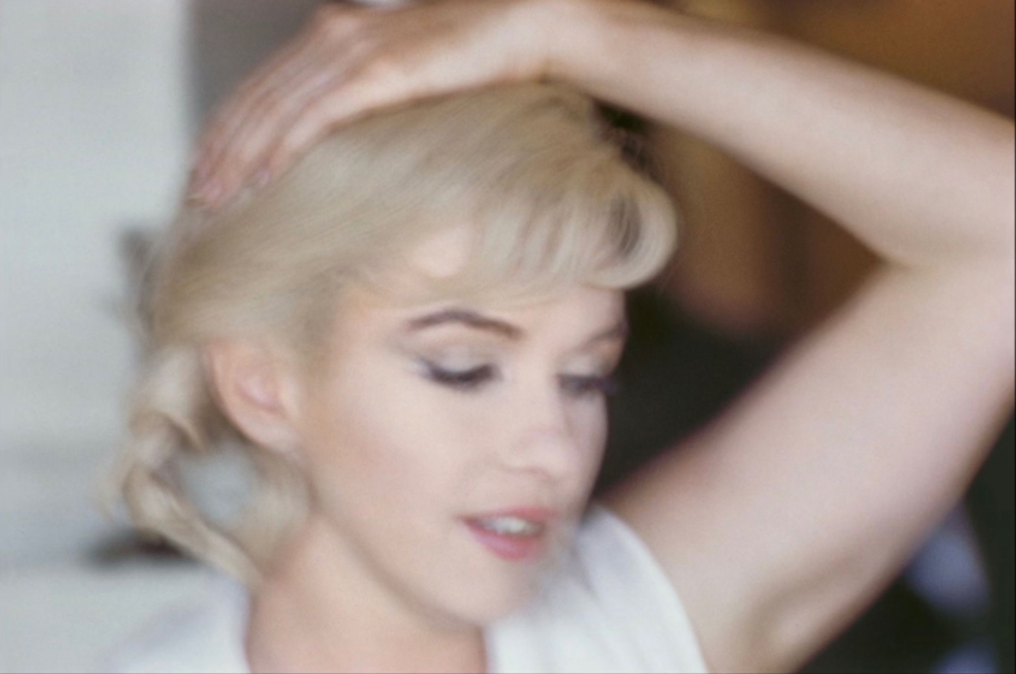 Soft focus photo of Marilyn Monroe on set of Misfits. Photo by Elliot Erwitt on assignment for Magnum Photos.