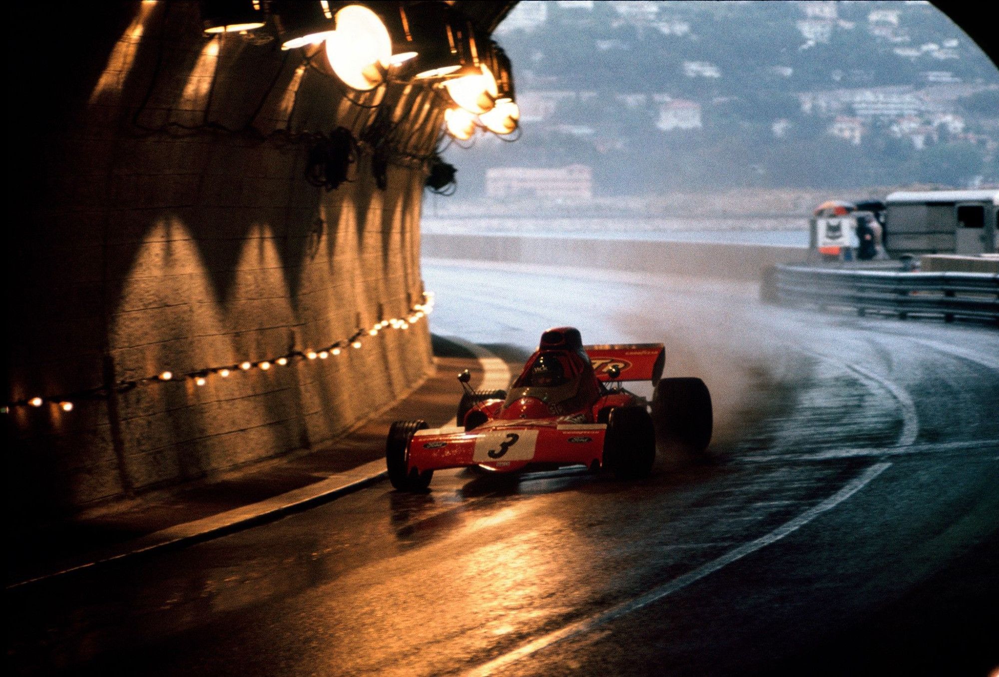 Photo taken from the entrance of the tunnel showing a march Car driving in.