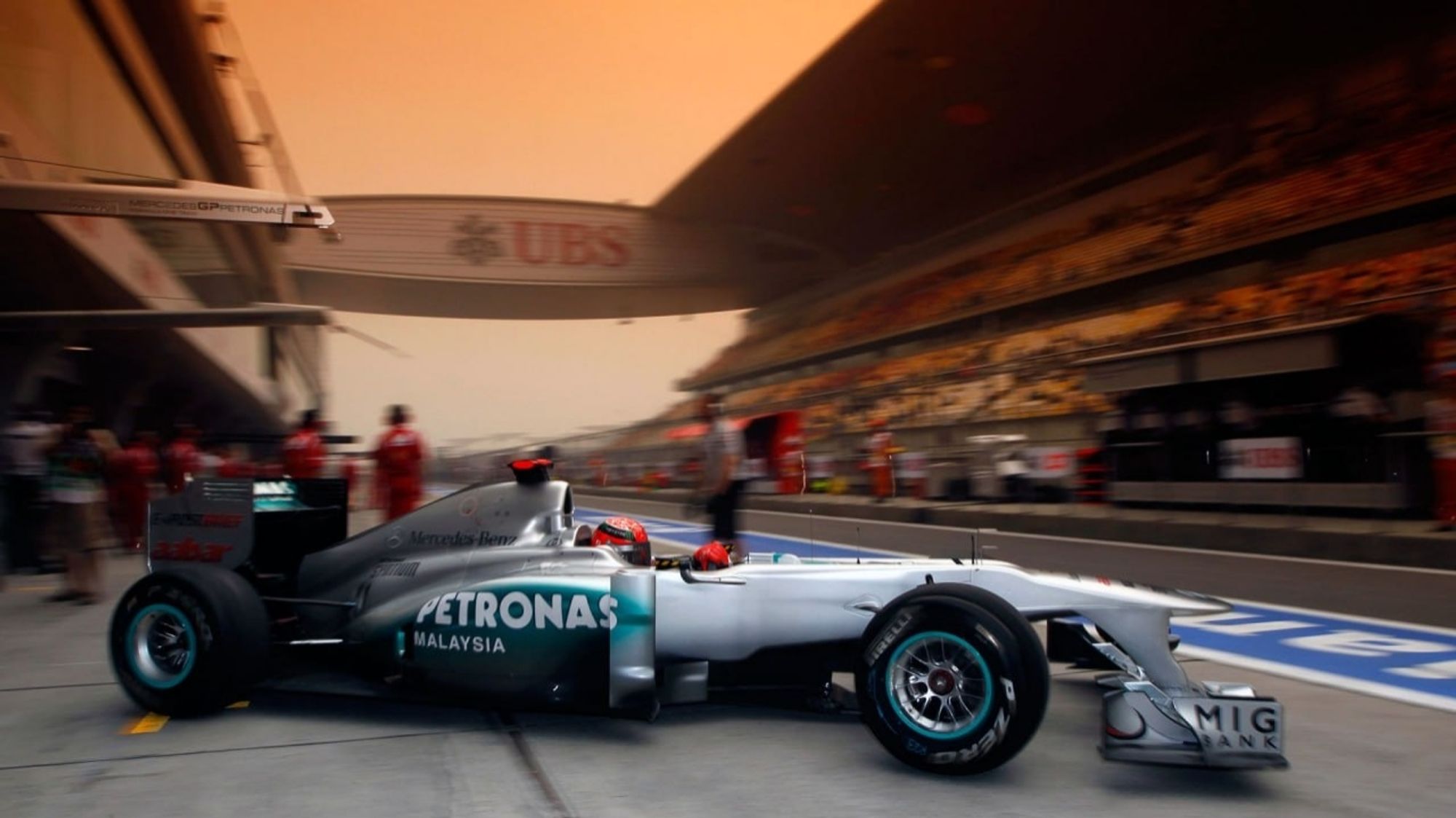 Close-up photo of the MGP W02 against a background that shows the Shanghai International Circuit pitlane.