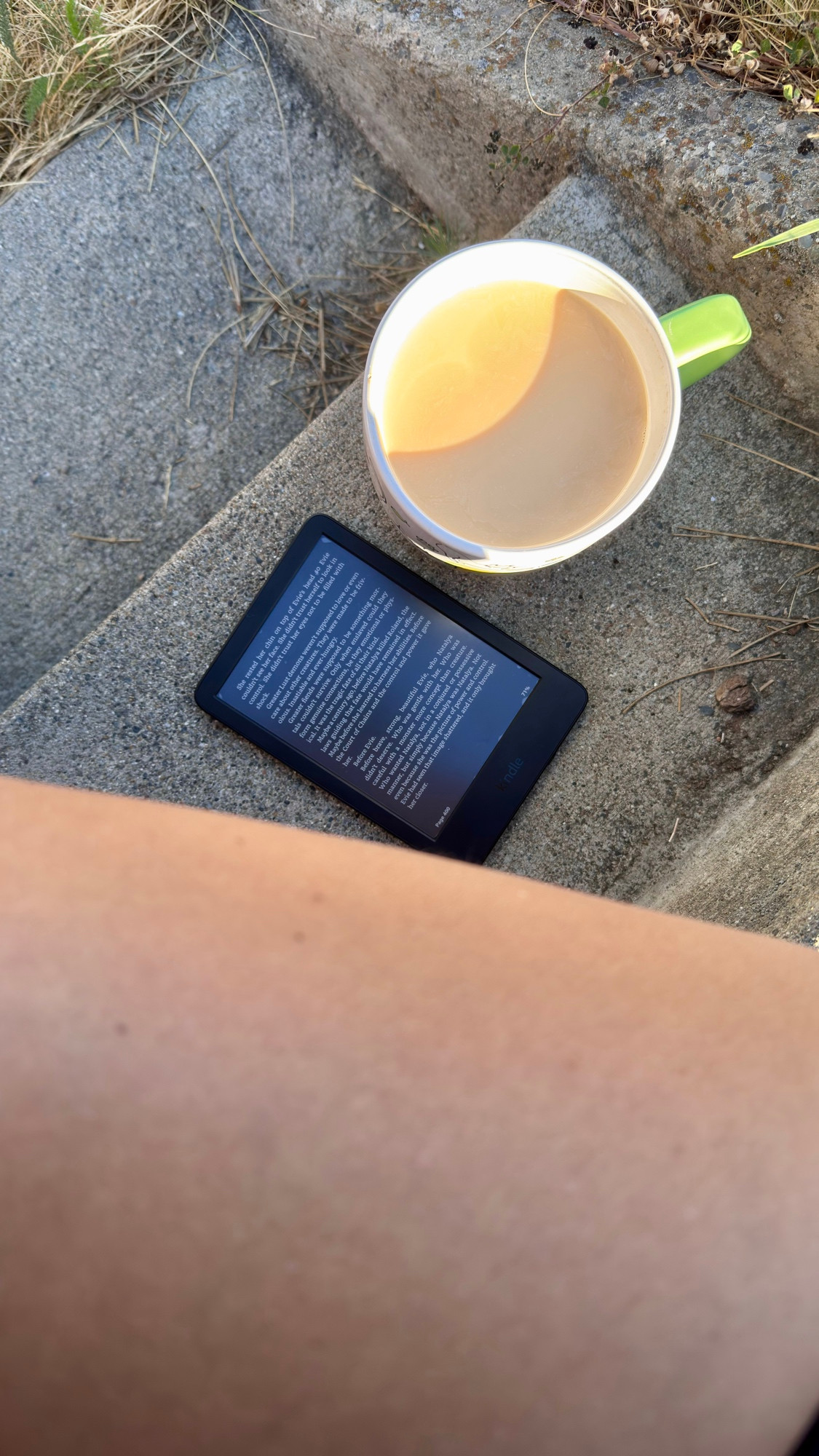 Leg, kindle and coffee
