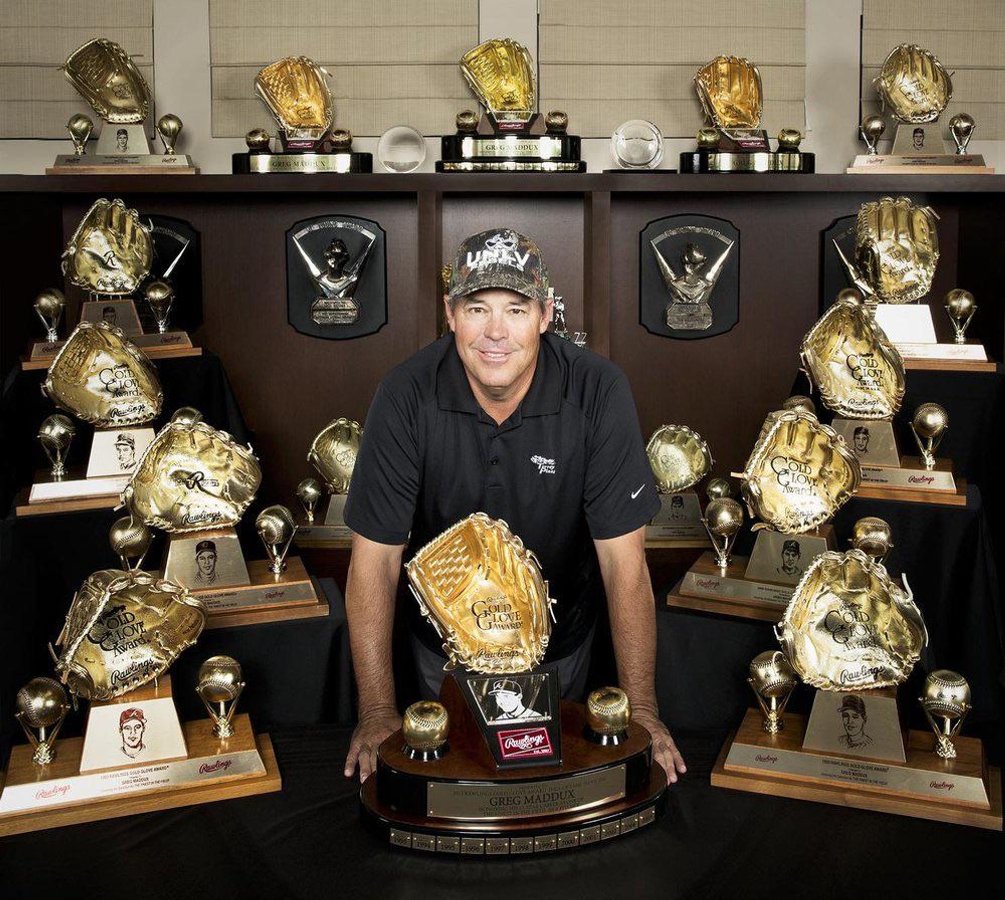 photo of greg maddux with his gold gloves