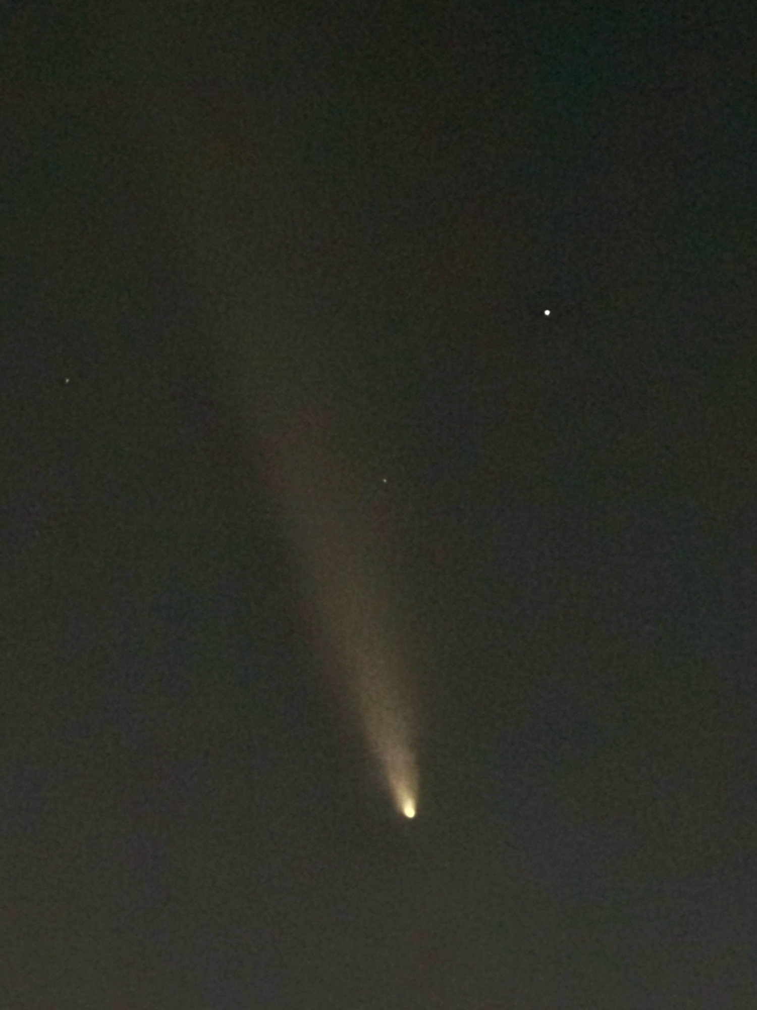 A picture of a comet with the tail across the entire frame